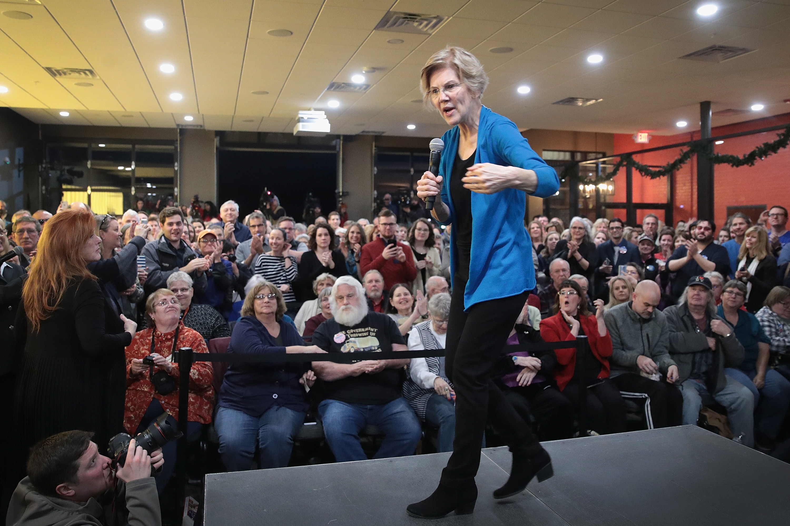 Warren was animated as she addressed a crowd at a Council Bluffs bar and restaurant.