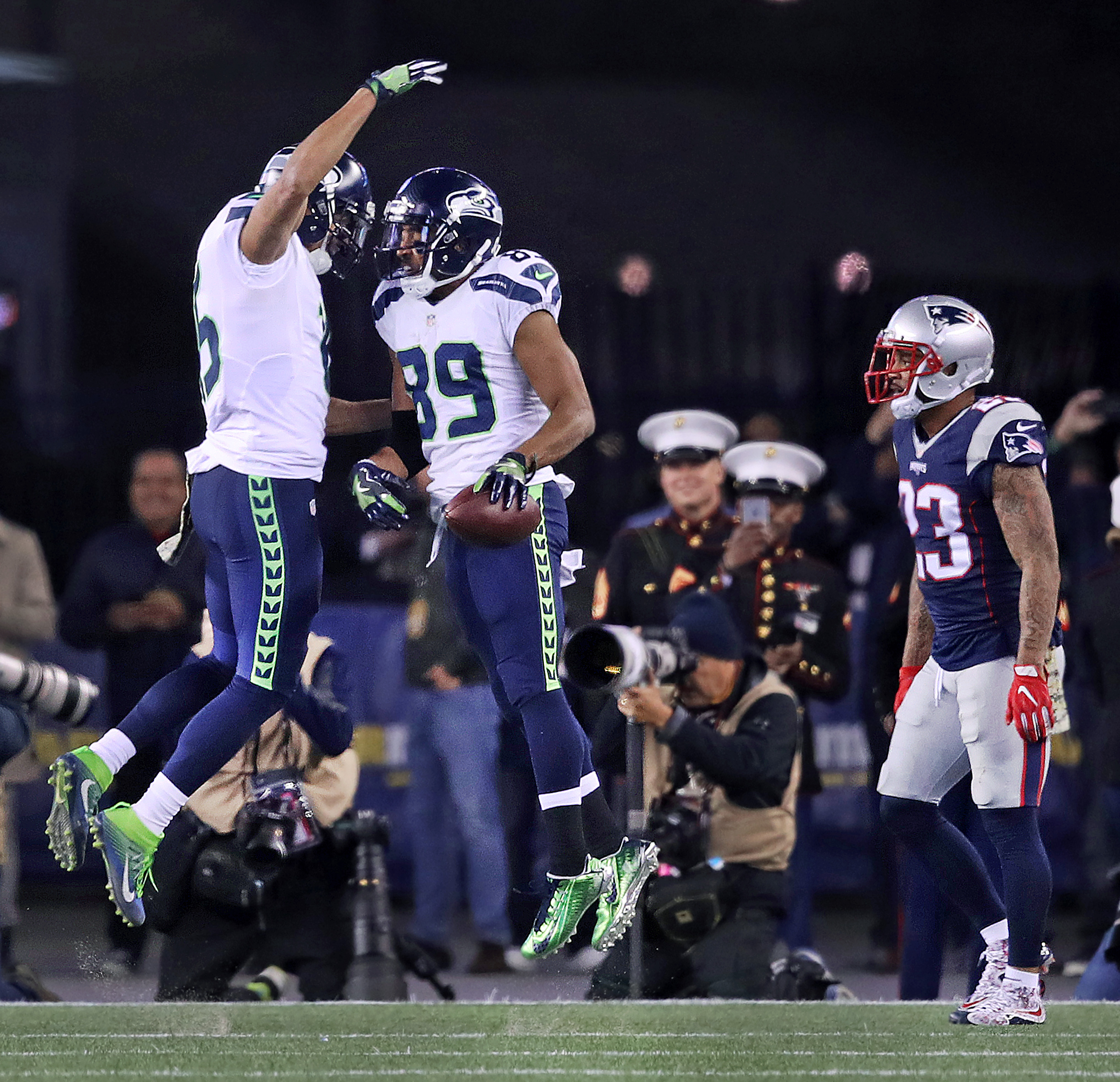 Part of the reason Doug Baldwin (89) caught three touchdown passes is because Patriots defensive backs were left in coverage too long, a result of New England’s poor pass rush.