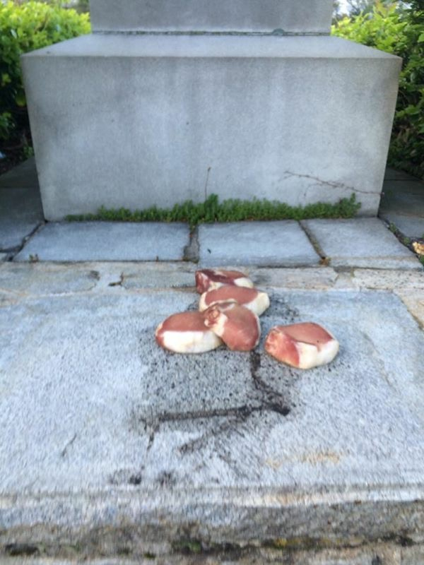 Vandals left large pieces of pork on the Holocaust Memorial.