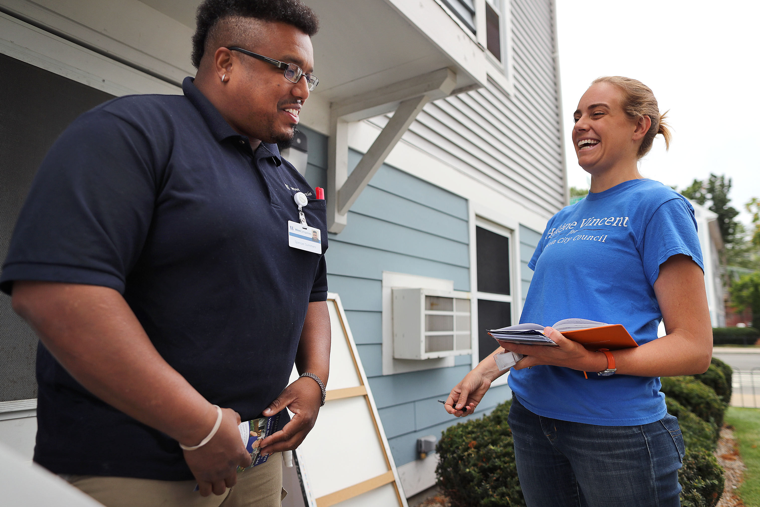 Vincent chatted with Spencer Summers on Smith Street in Mission Hill during her door-to-door campaigning.