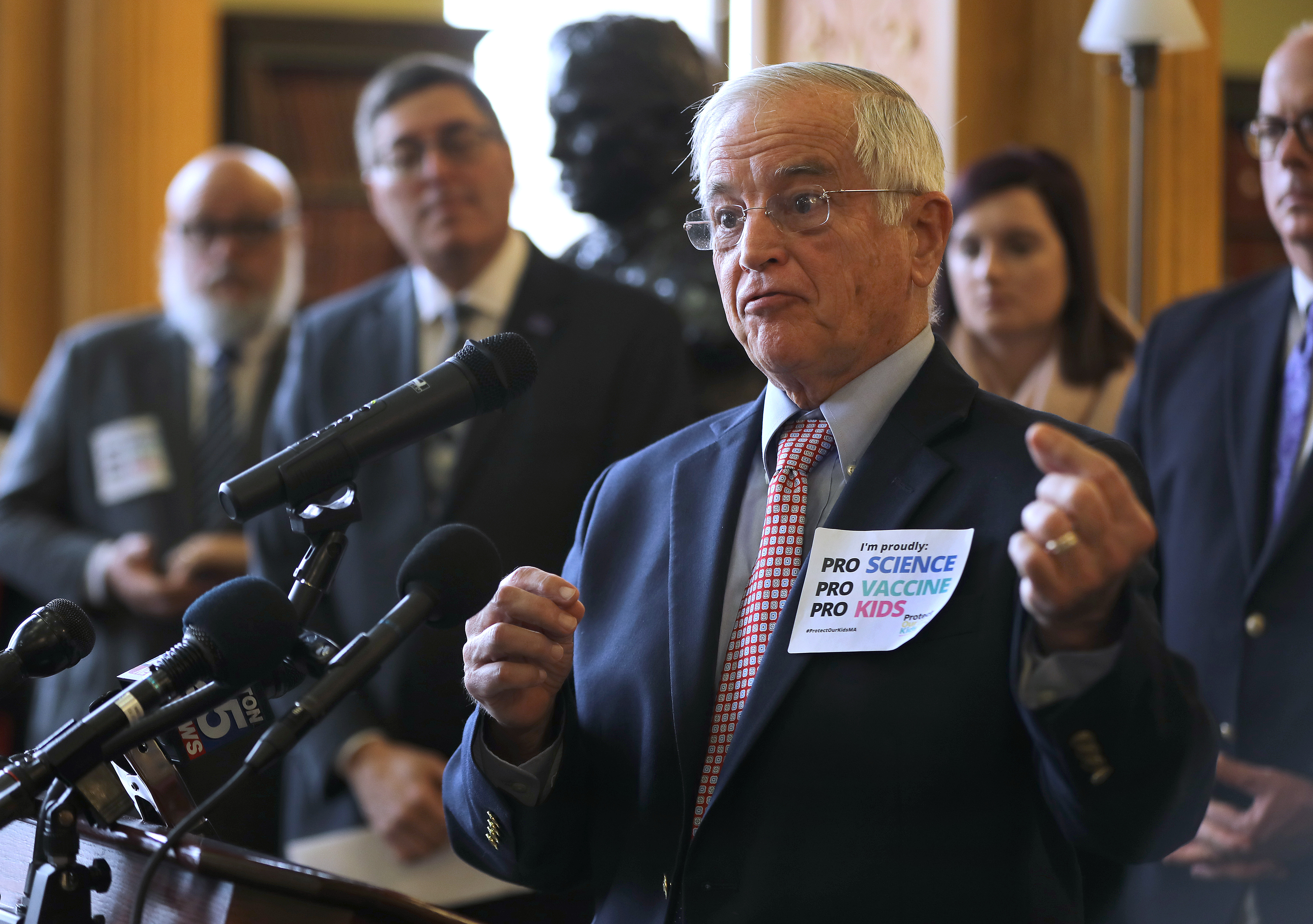 Dr. Richard Moriarty, a professor of pediatrics at UMass Medical School, speaks at a press conference on Tuesday at the State House in support of removing the religious exemption to vaccines in Massachusetts.