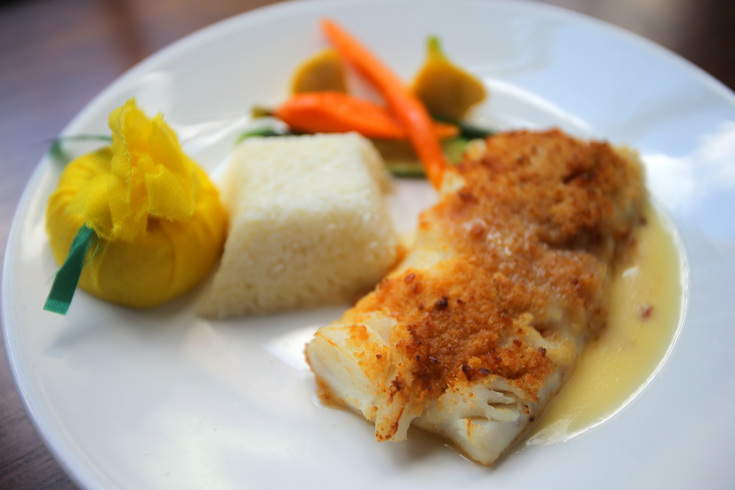 Baked schrod with jasmine rice, pattypan squash, zucchini, carrots, and green beans.