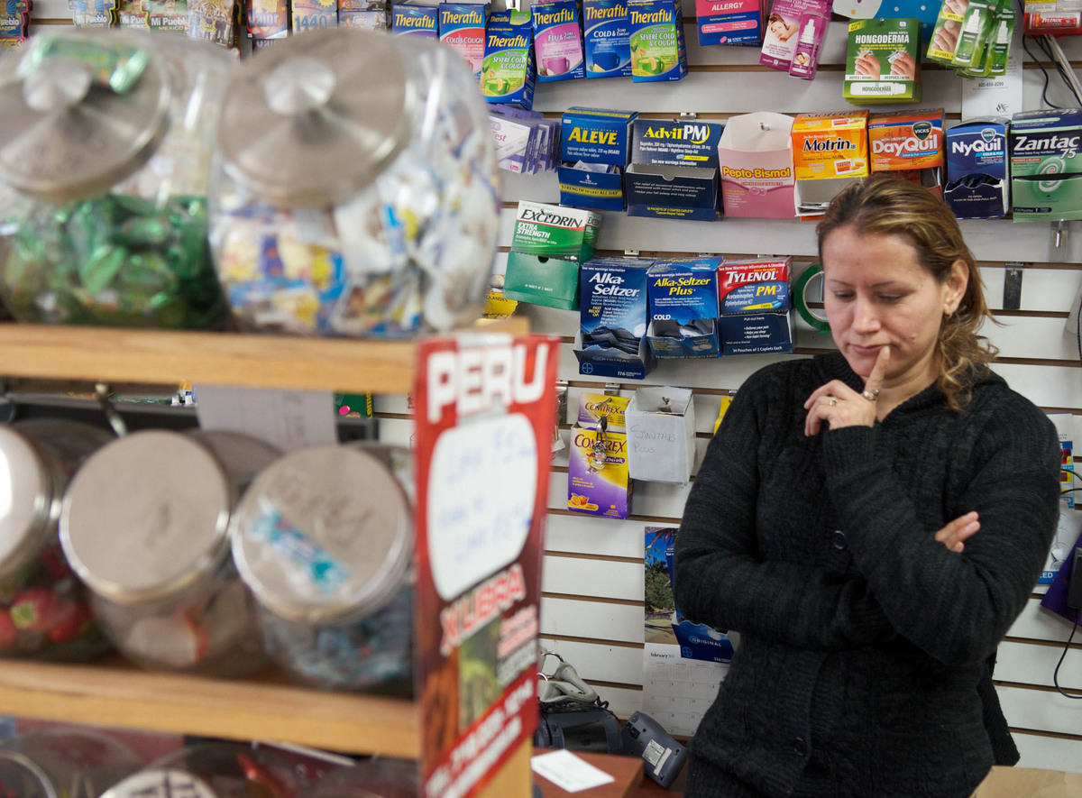 Marcia Chacón, owner of My Country Store, lost business as immigrants fearful of police stayed away. She said police were “supposed to protect us, but’’ instead, “They kept us in terror.’’