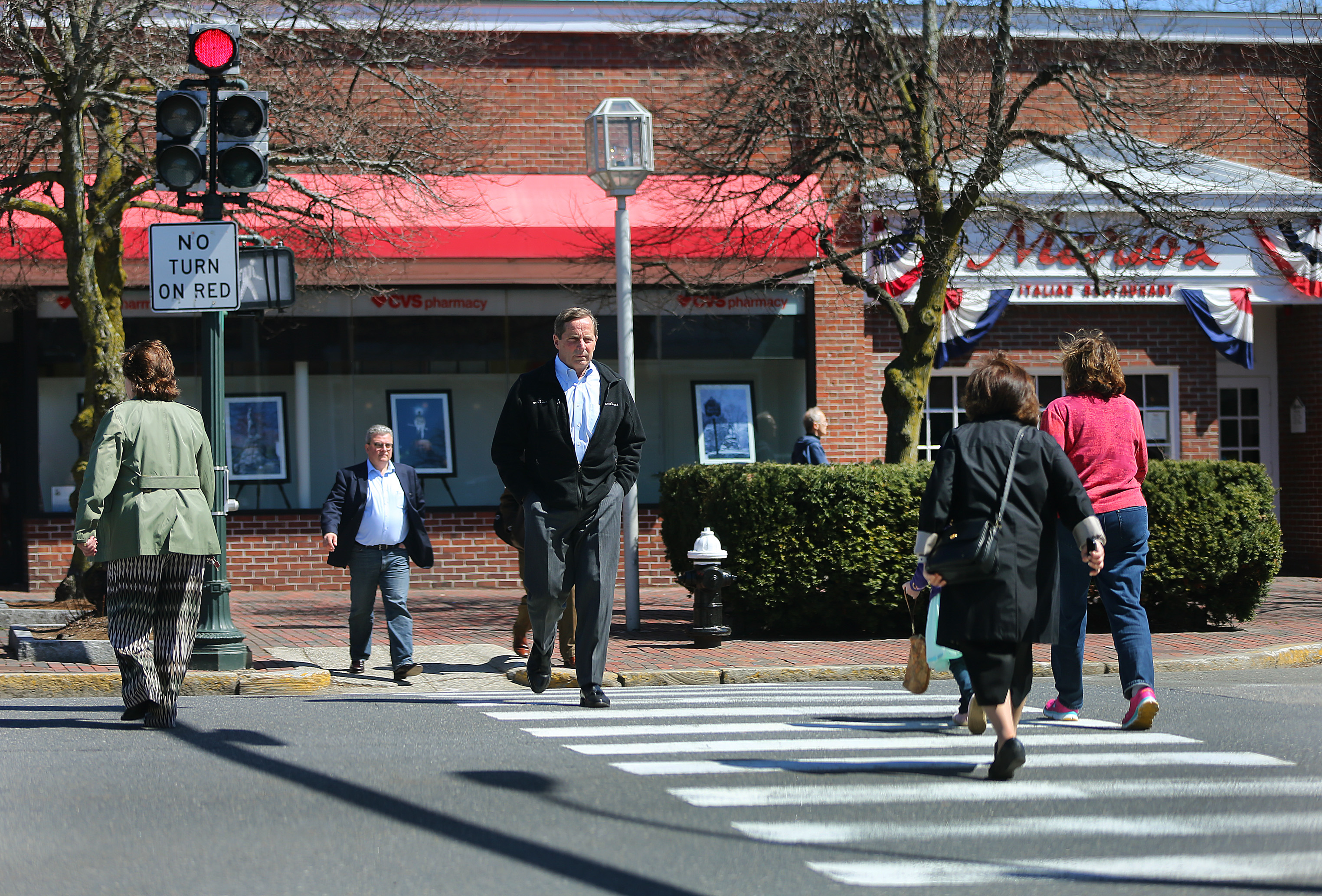 Pedestrians crossed Massachusetts Avenue in Lexington.