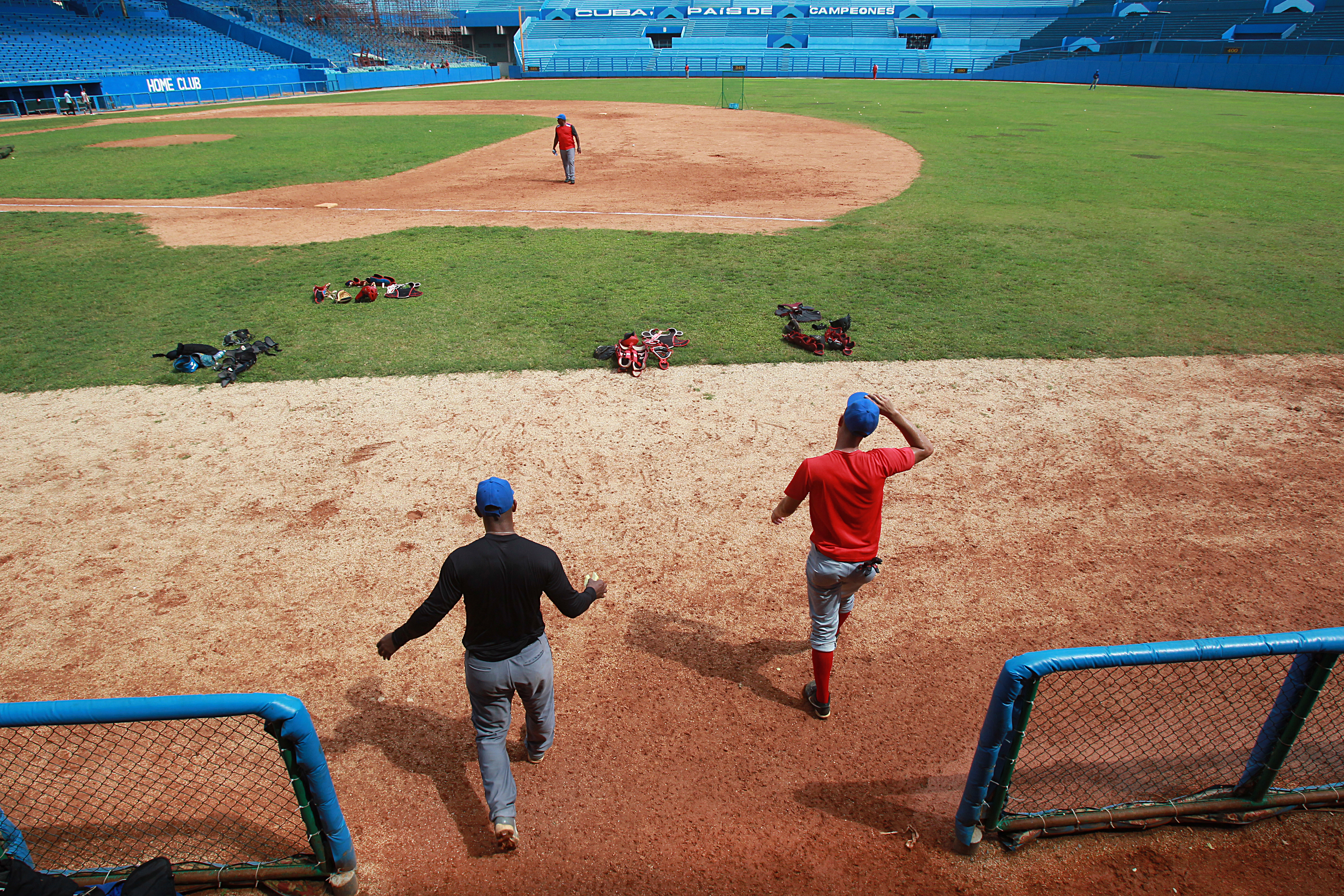 Baseball players try out for a spot on the National Team of Cuba at the Estadio Latino Americano.