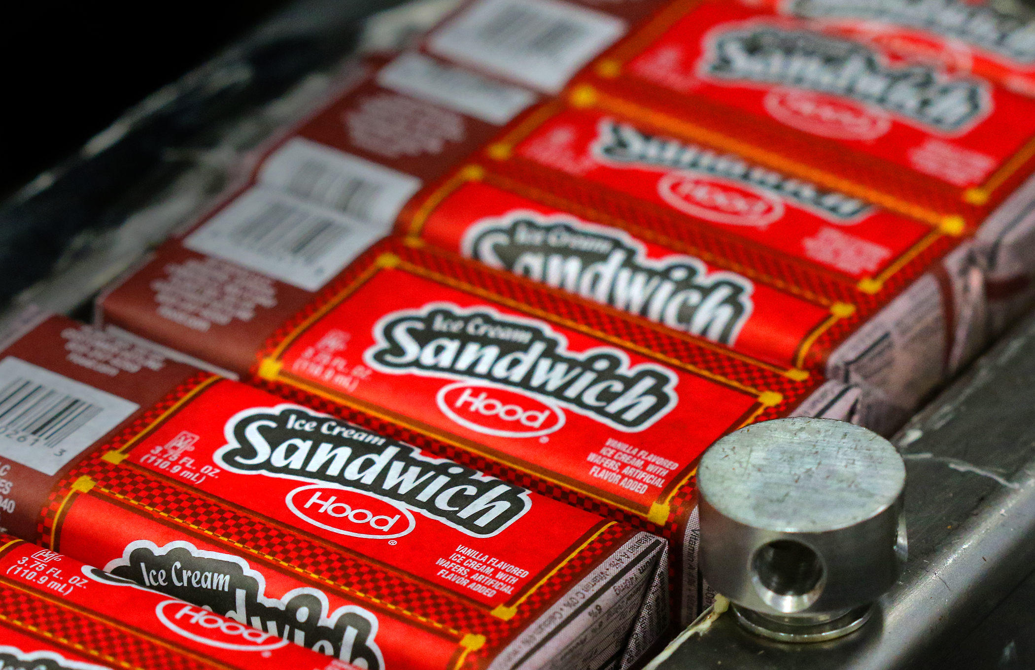 Ice cream sandwiches speed along the line at the HP Hood Ice Cream plant in Suffield, Conn.