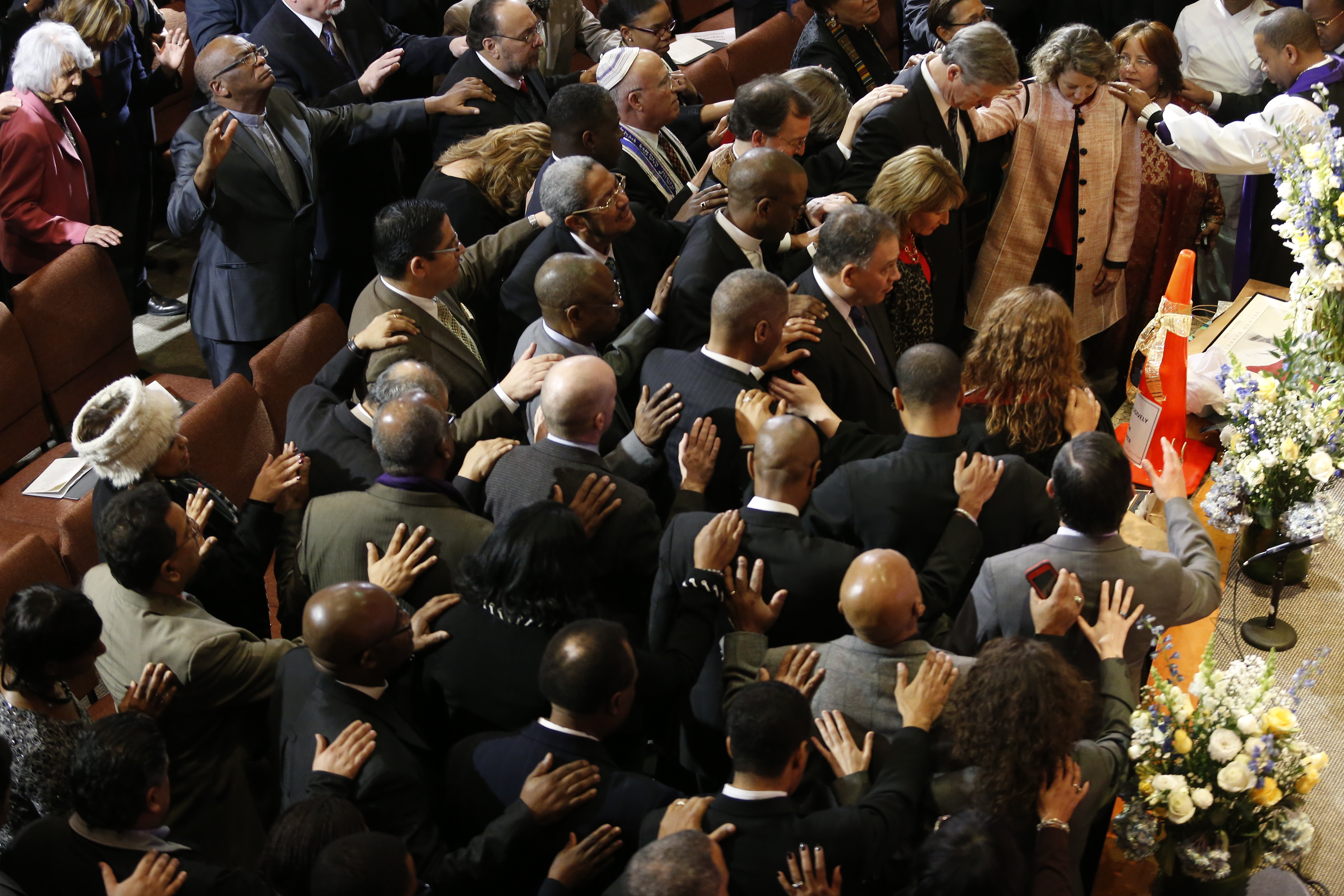 Governor-elect Charlie Baker and his wife, Lauren, attended a prayer service at the Lion of Judah on Wednesday.