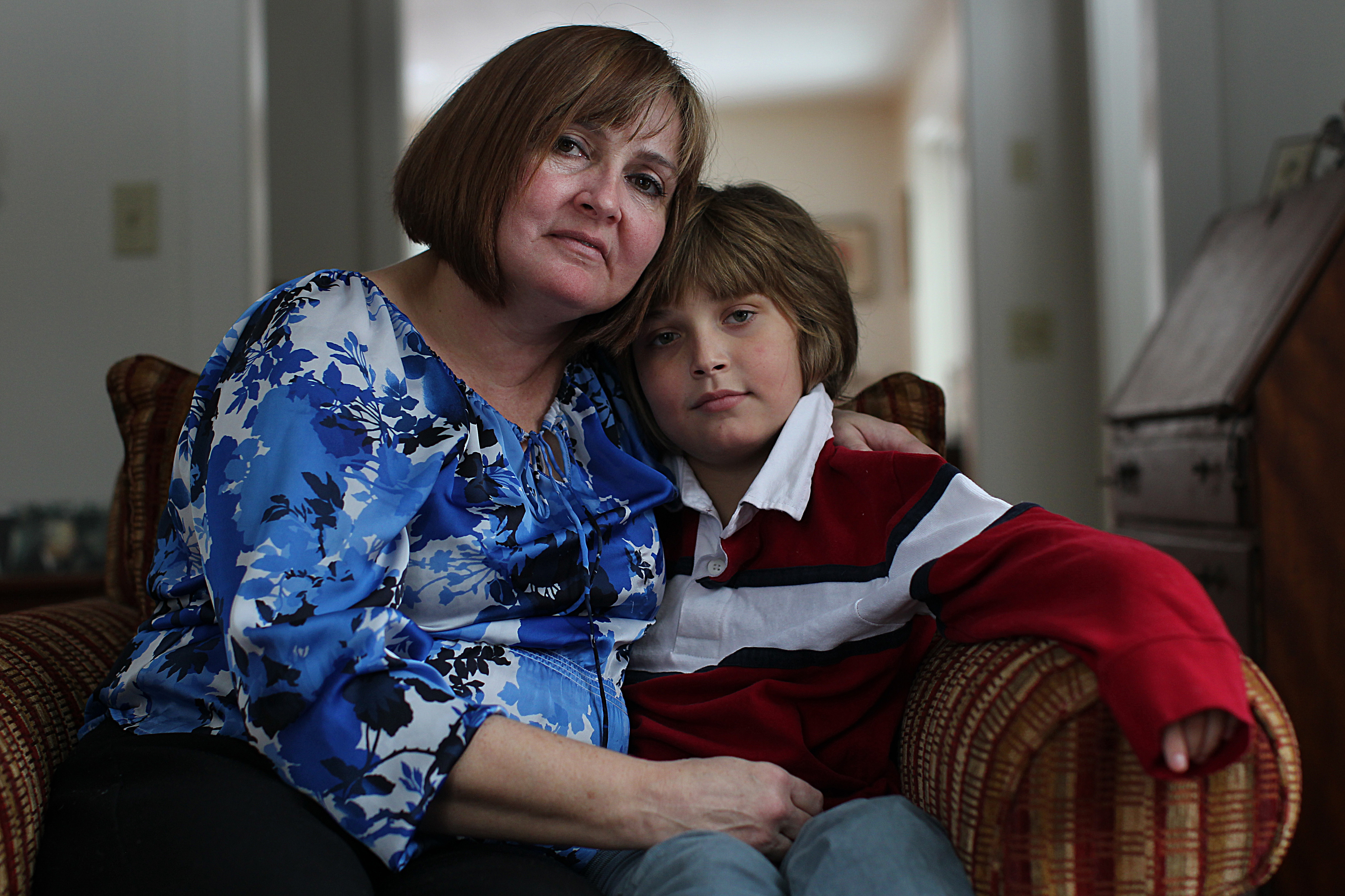 Genevieve Kelley with her son John, at her lawyer’s New Hampshire home.