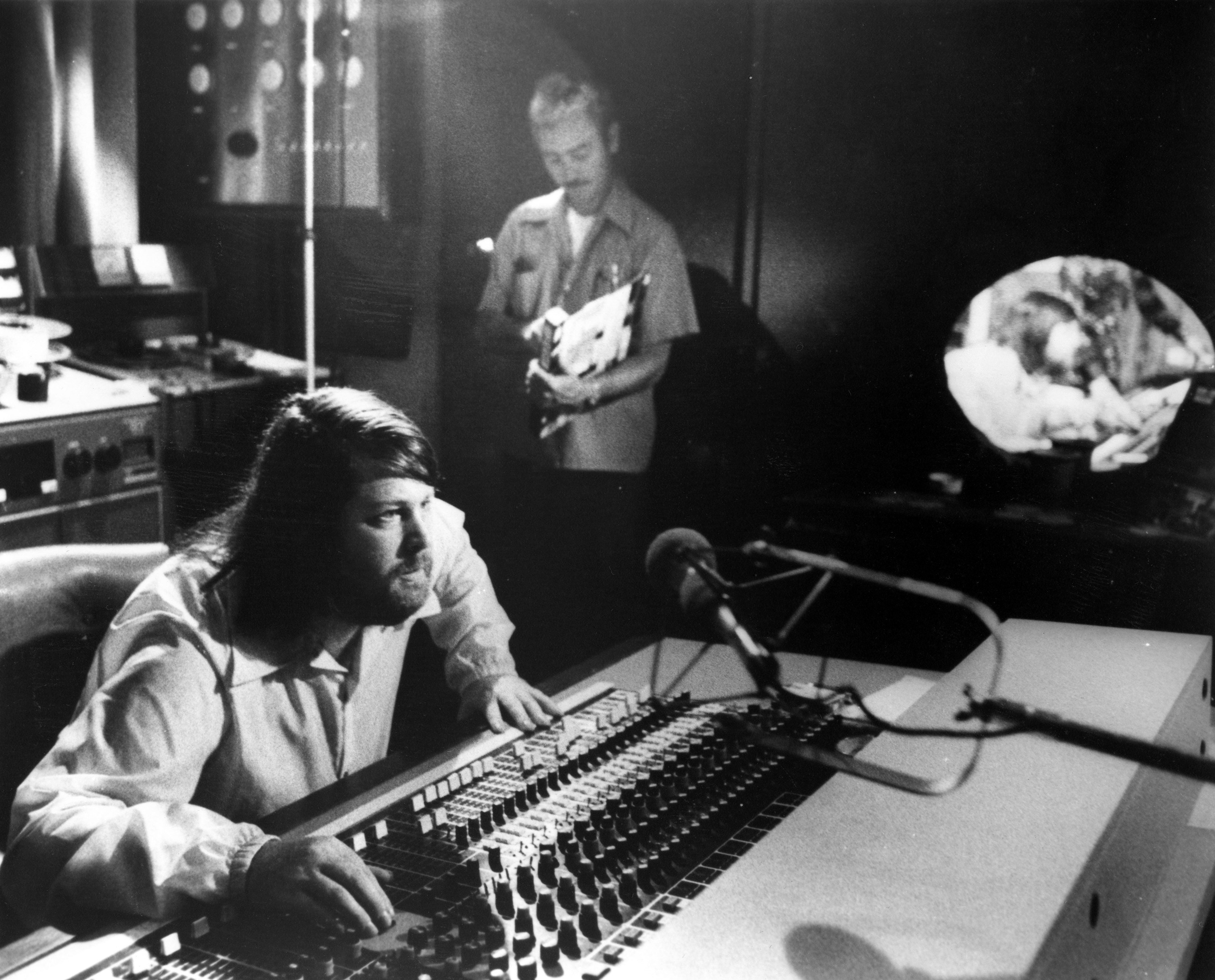 Singer and producer Brian Wilson of the The Beach Boys worked the sound board in a studio in circa 1975.