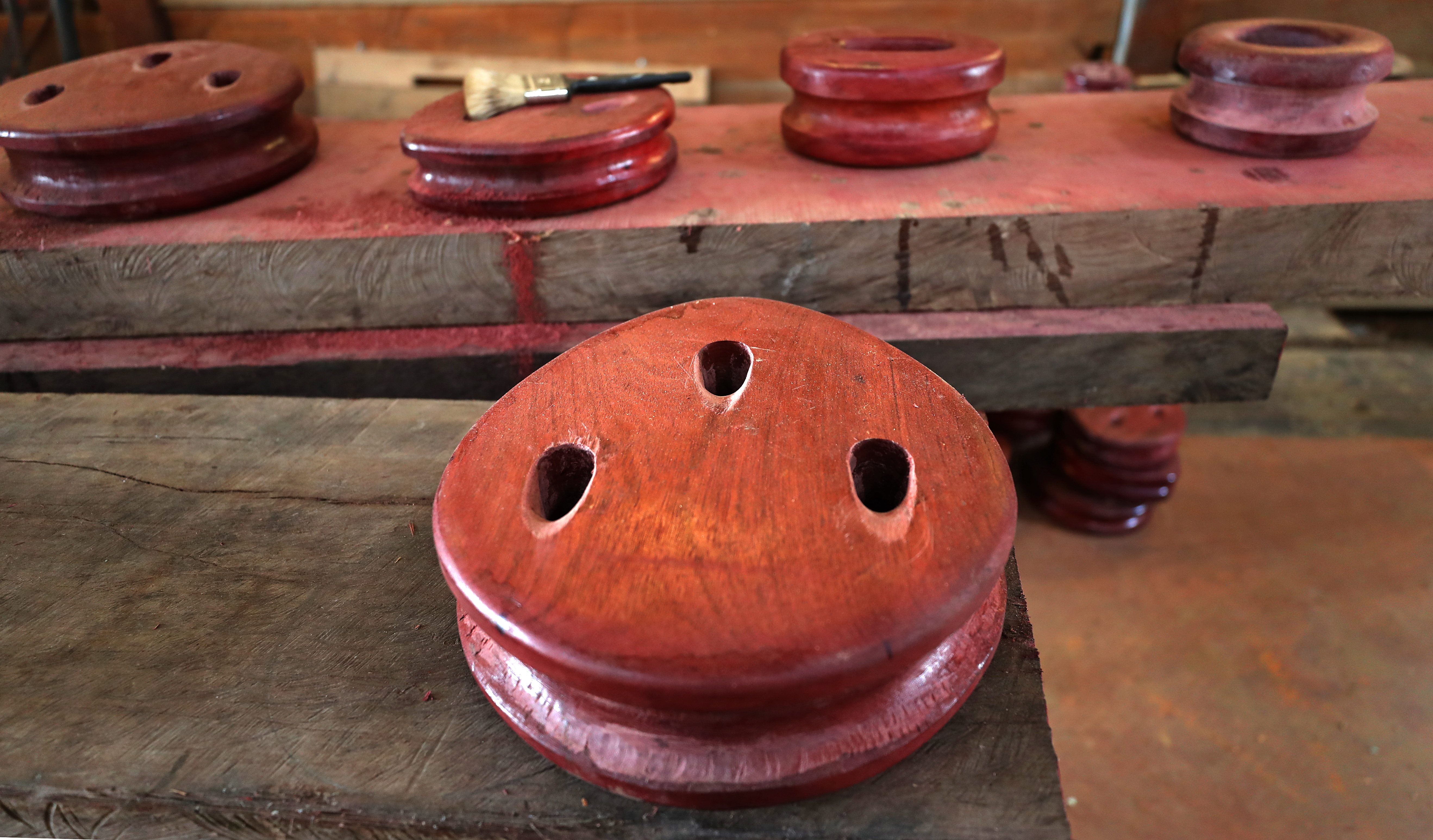 Purple heart wooden deadeyes for The Mayflower II.
