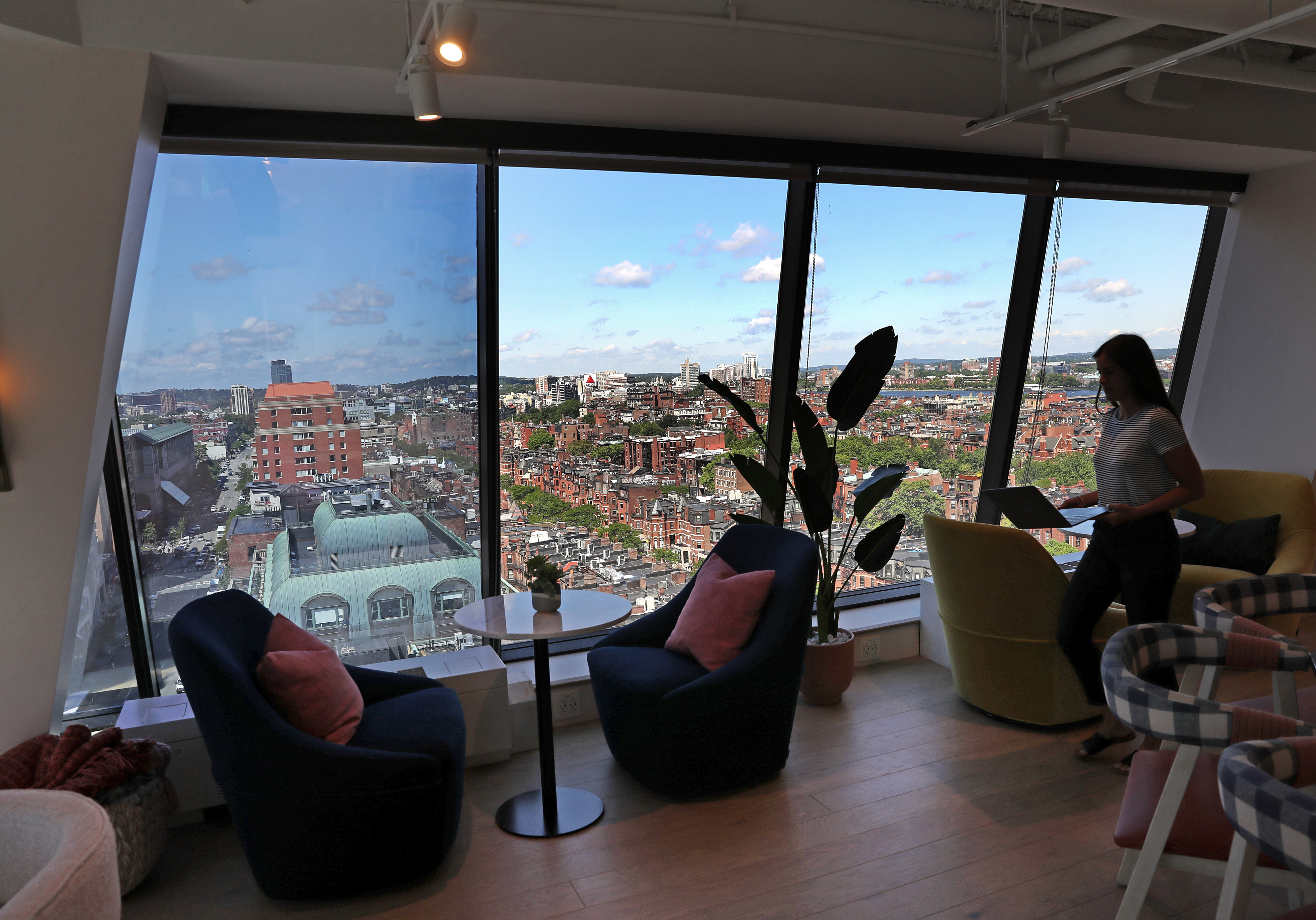 The Wing’s Boston location, a two-floor space at 699 Boylston St. (right), is the company’s eighth. Membership is priced at $185 a month.