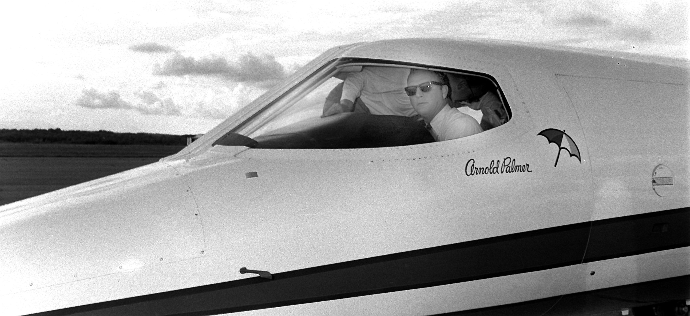 Palmer was in the cockpit of his plane after landing at the then-Worcester Airport in 1968.