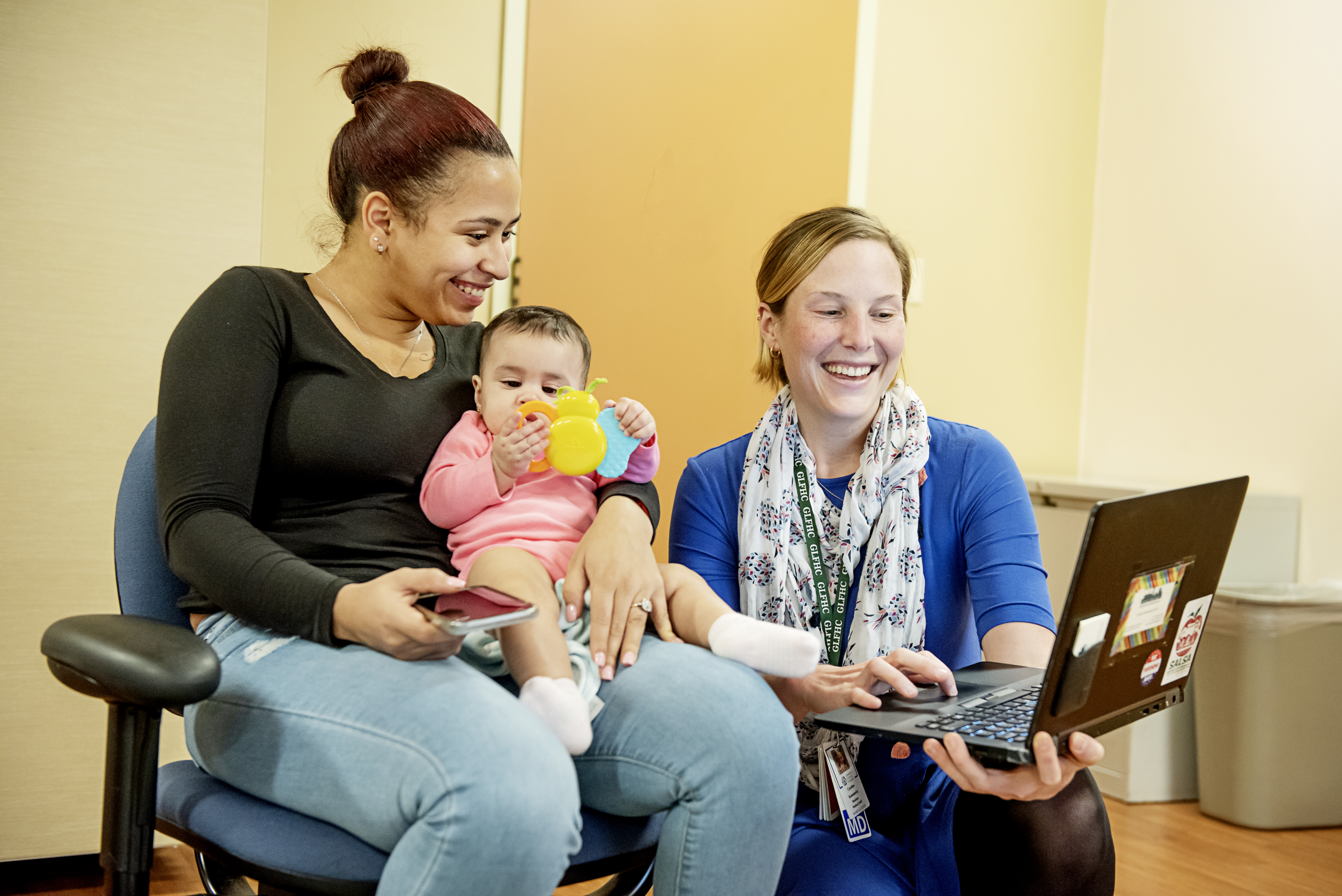 Geisha Florian-Bierd holds her baby, Leisha Villa, during a health visit at the Greater Lawrence Family Health Center in January.