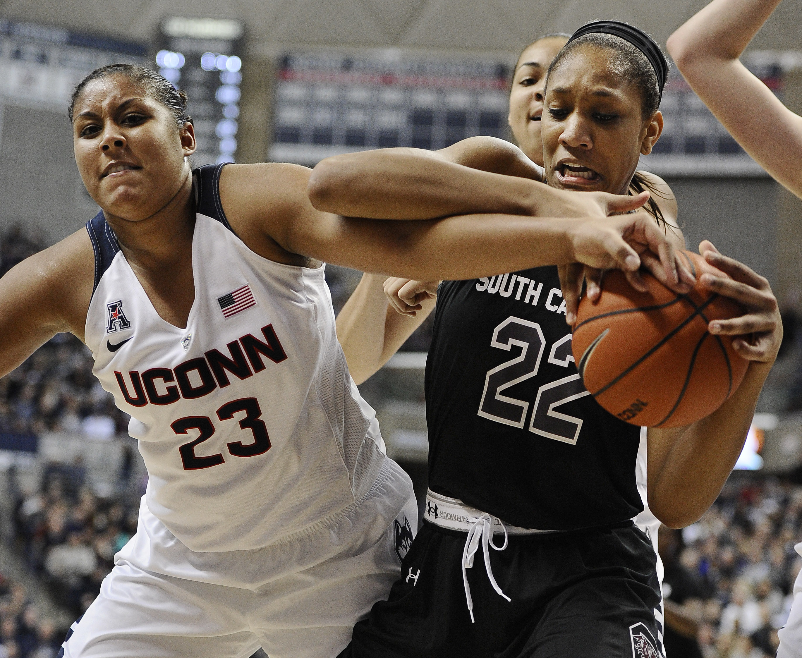 UConn’s Kaleena Mosqueda-Lewis reaches for the ball against South Carolina’s A'ja Wilson in the second half.