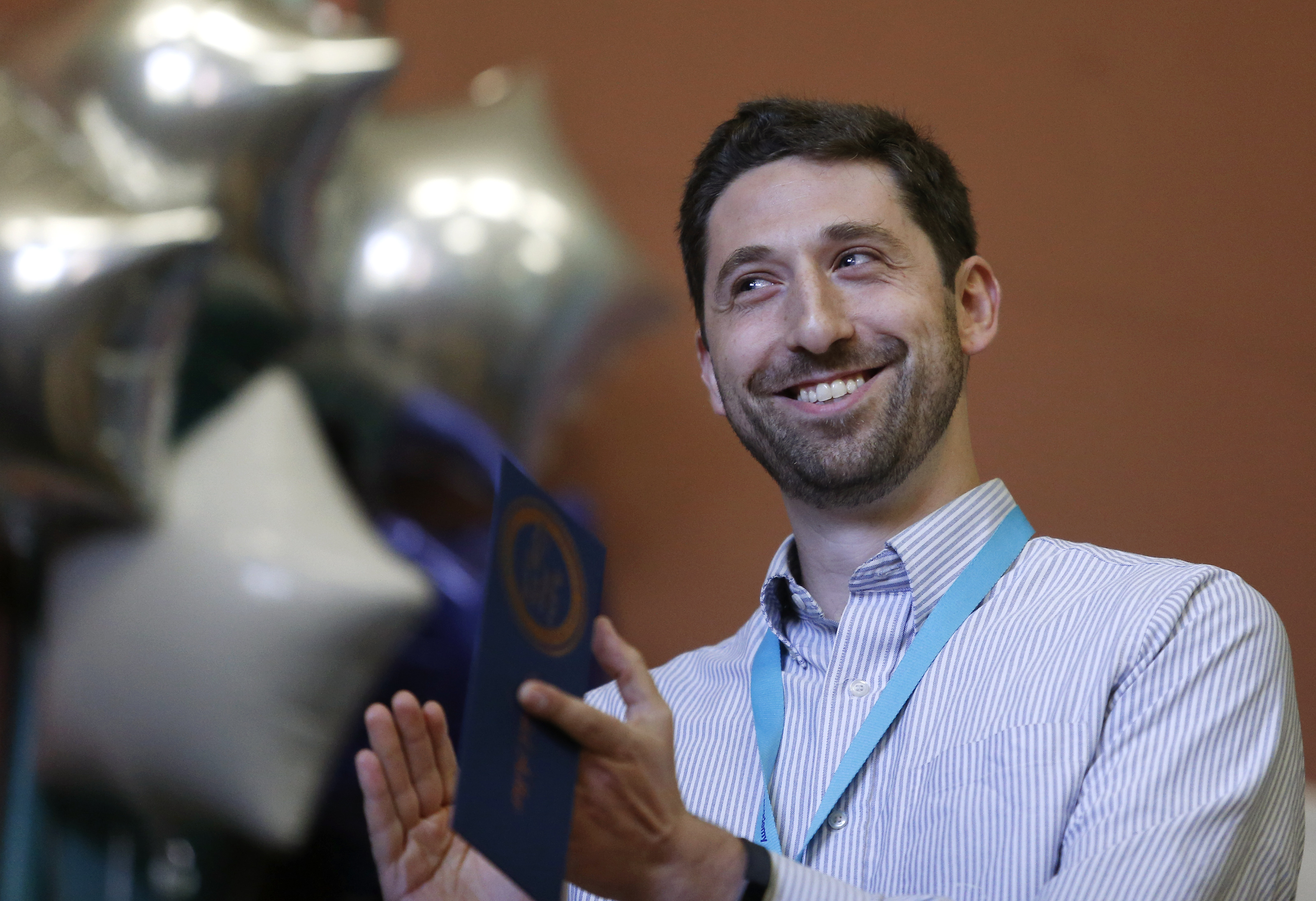 Daniel Adler, a sixth grade Science teacher at Up Academy Leonard in Lawrence reacted as he is named the recipient of the $25,000 Milken Award.