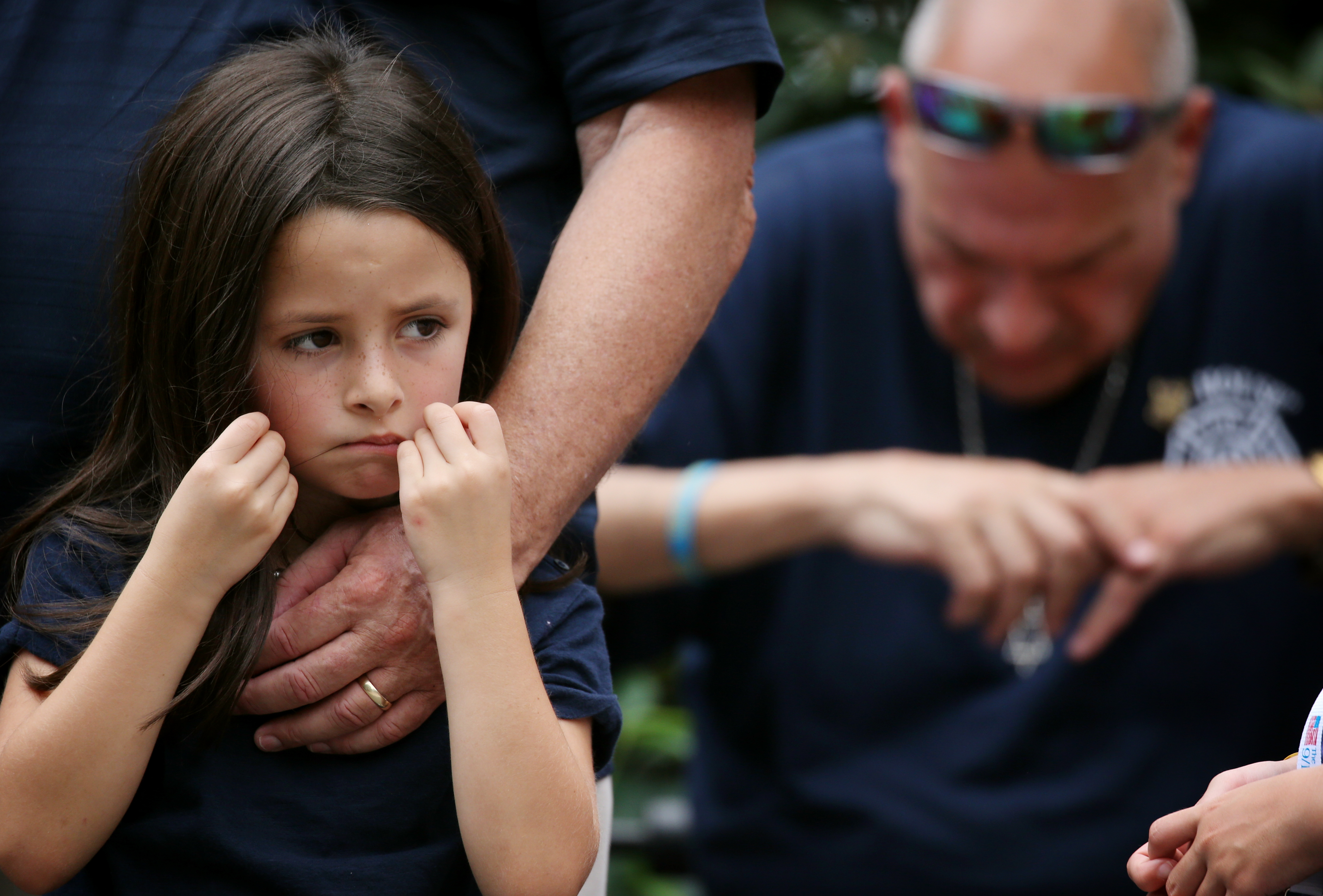 Katherine Kane stands with her grandfather George Kane at the Public Garden. George and Faye Kane lost a daughter, Jennifer Kane, who was working in the North Tower.