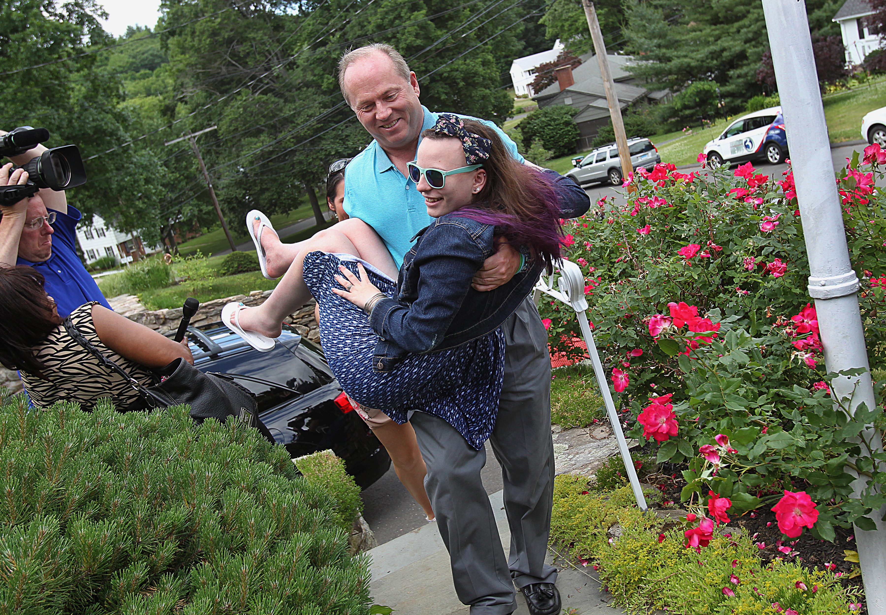 In June 2014, Justina Pelletier was carried into her Connecticut home by her father, Lou.