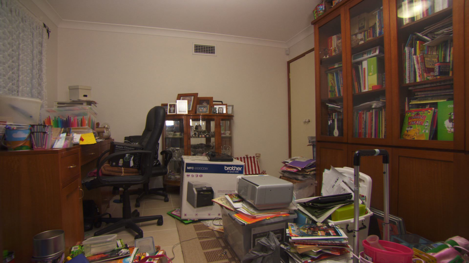 A before shot of a cluttered office.