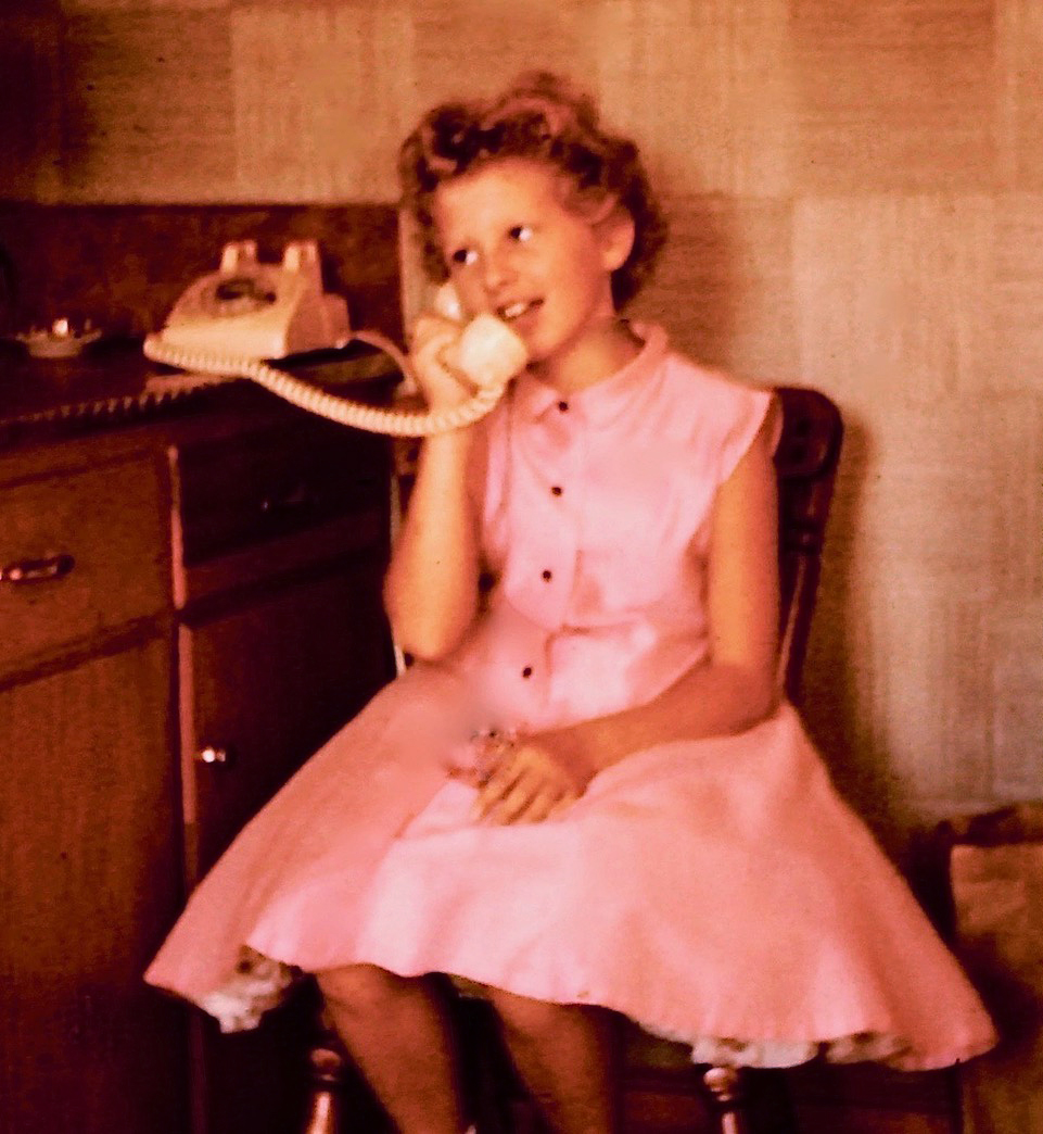 Beverly Beckham, at age 11, wearing her favorite dress. “It was pink, not too pale and not too bright,” she writes.