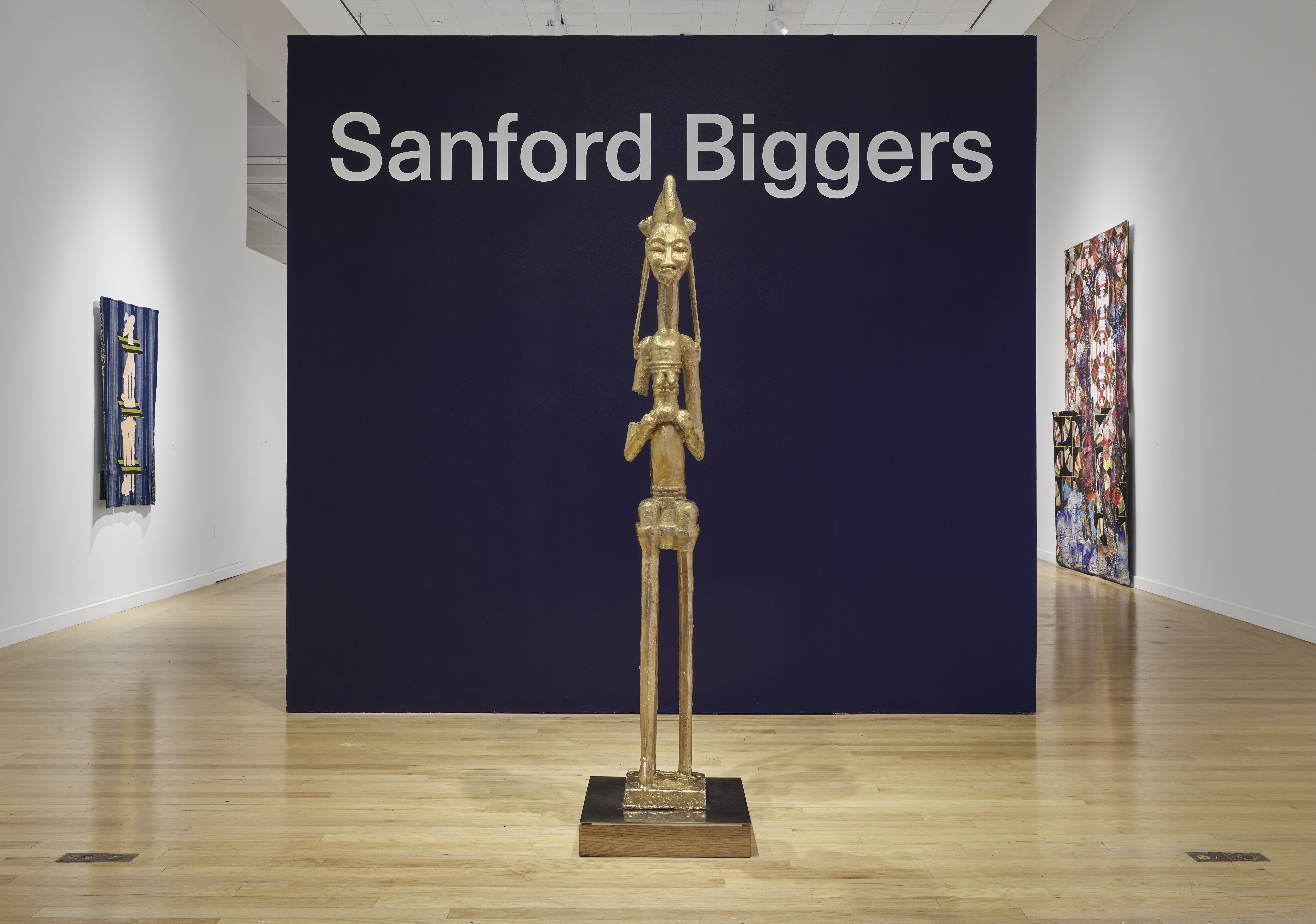 “BAM (Seated Warrior)” greets visitors when they enter the Sanford Biggers exhibition at Tufts University Art Galleries.