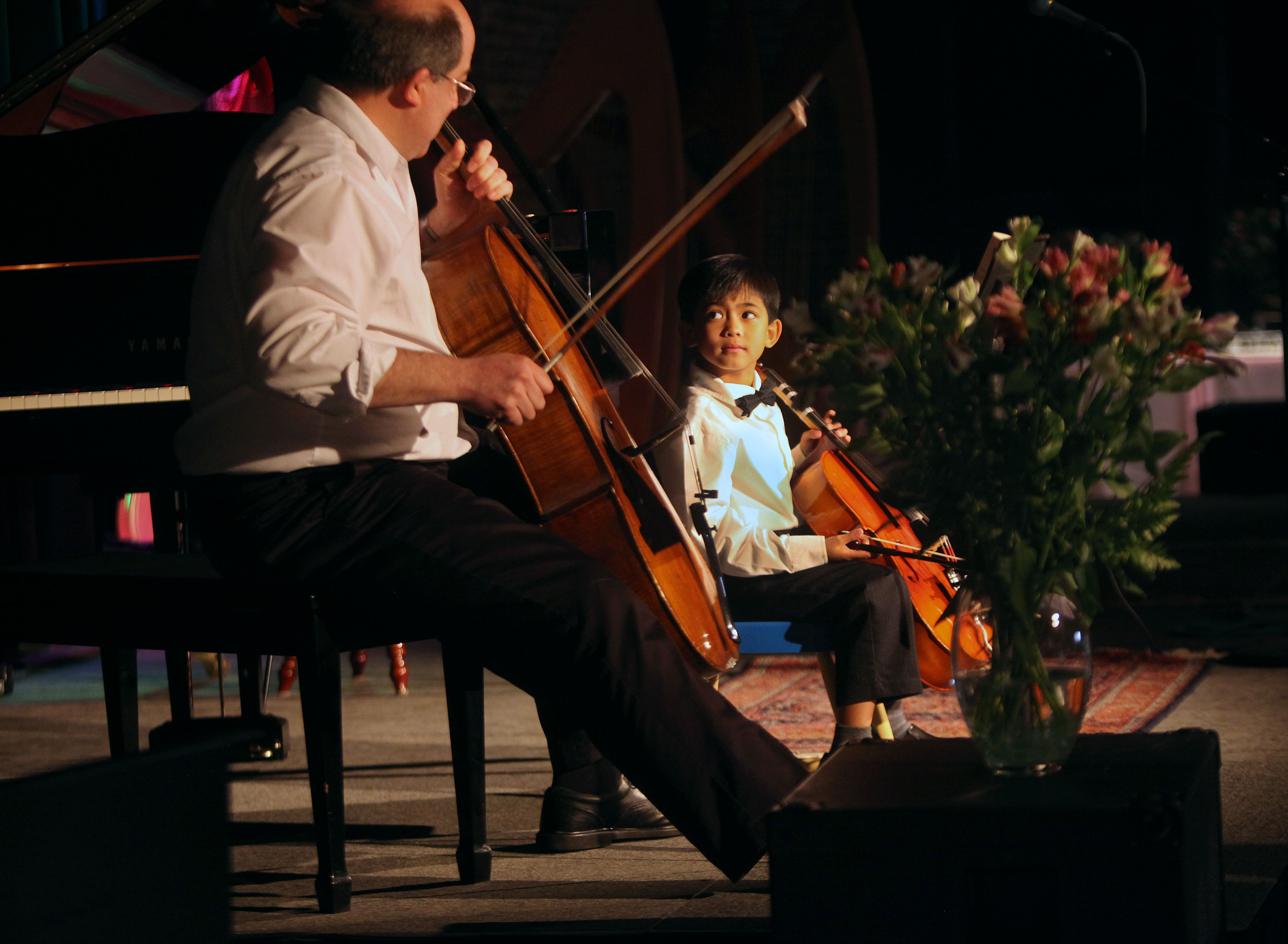 Teacher Tim Roberts and student Johann Mari collaborating on “Allegro” by S. Suzuki.