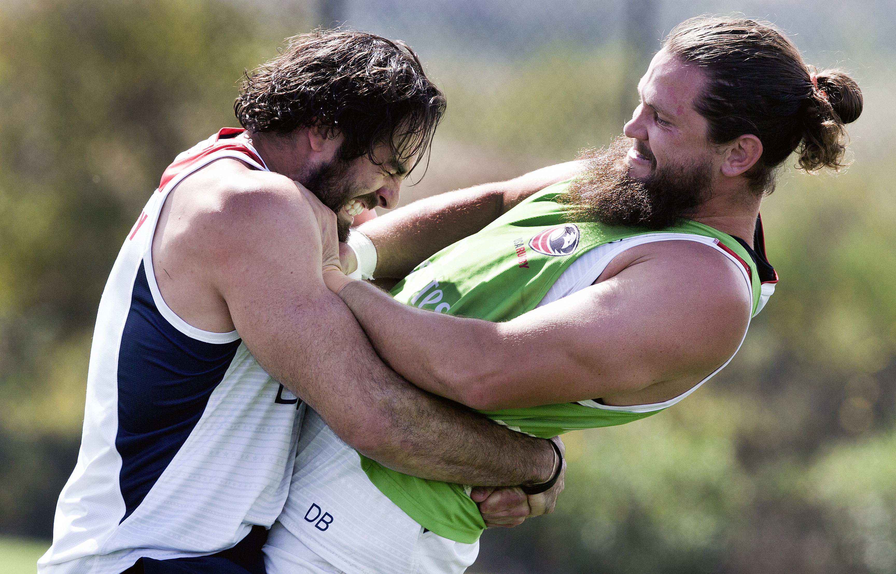 Nate Ebner (left) and US rugby teammate Danny Barrett go at it in training.