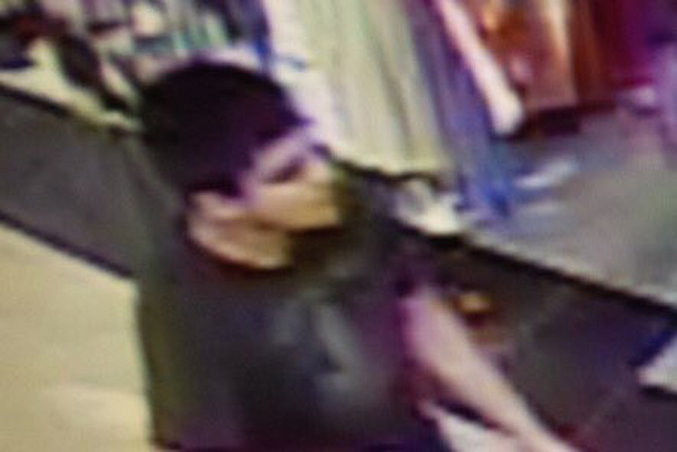 This video image provided by Skagit County Department of Emergency Management shows a suspect wanted by the authorities in connection with a shooting at the Cascade Mall in Burlington, Wash.