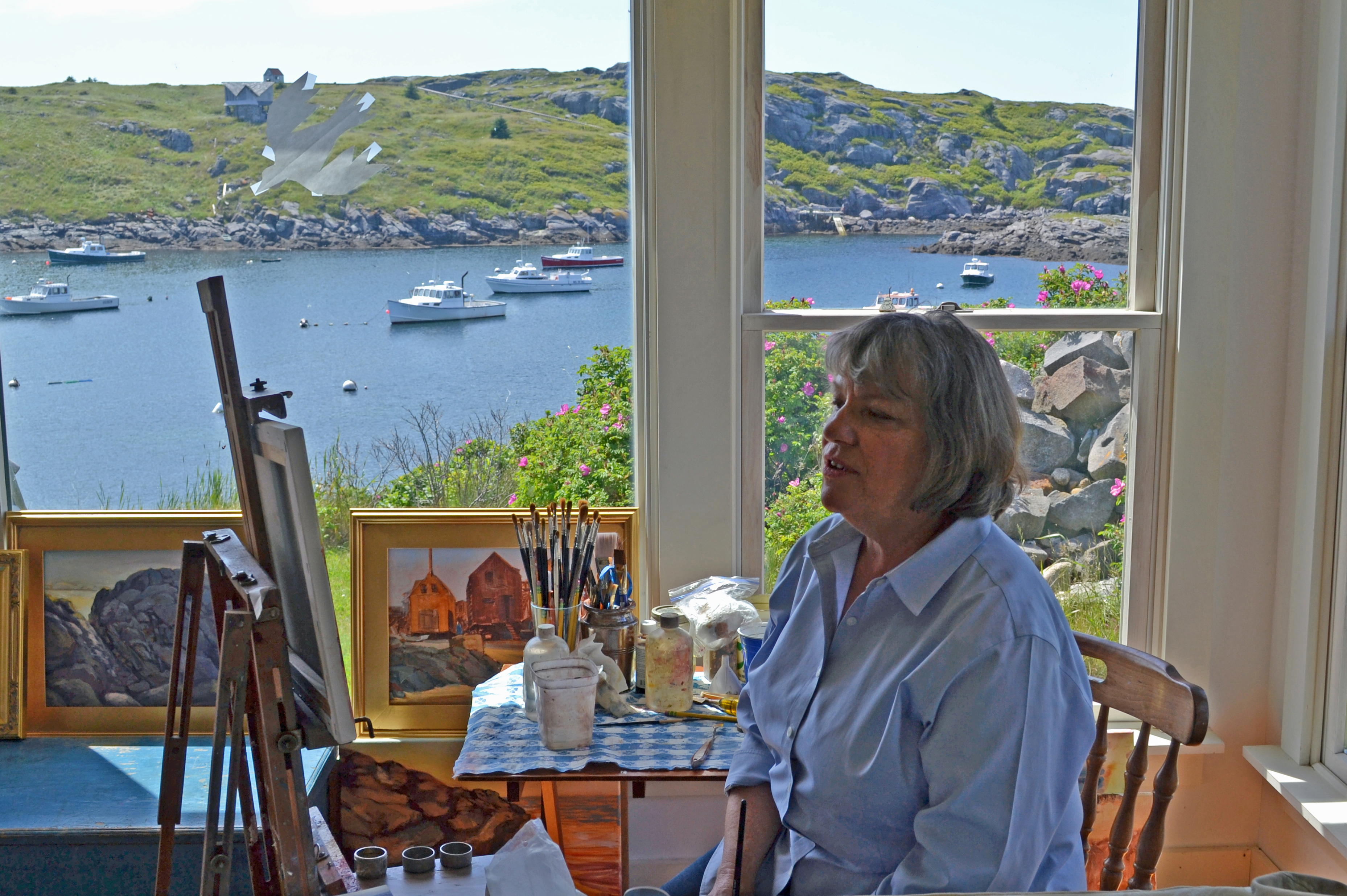 Susan Gilbert painted in her studio overlooking the harbor on Monhegan Island.