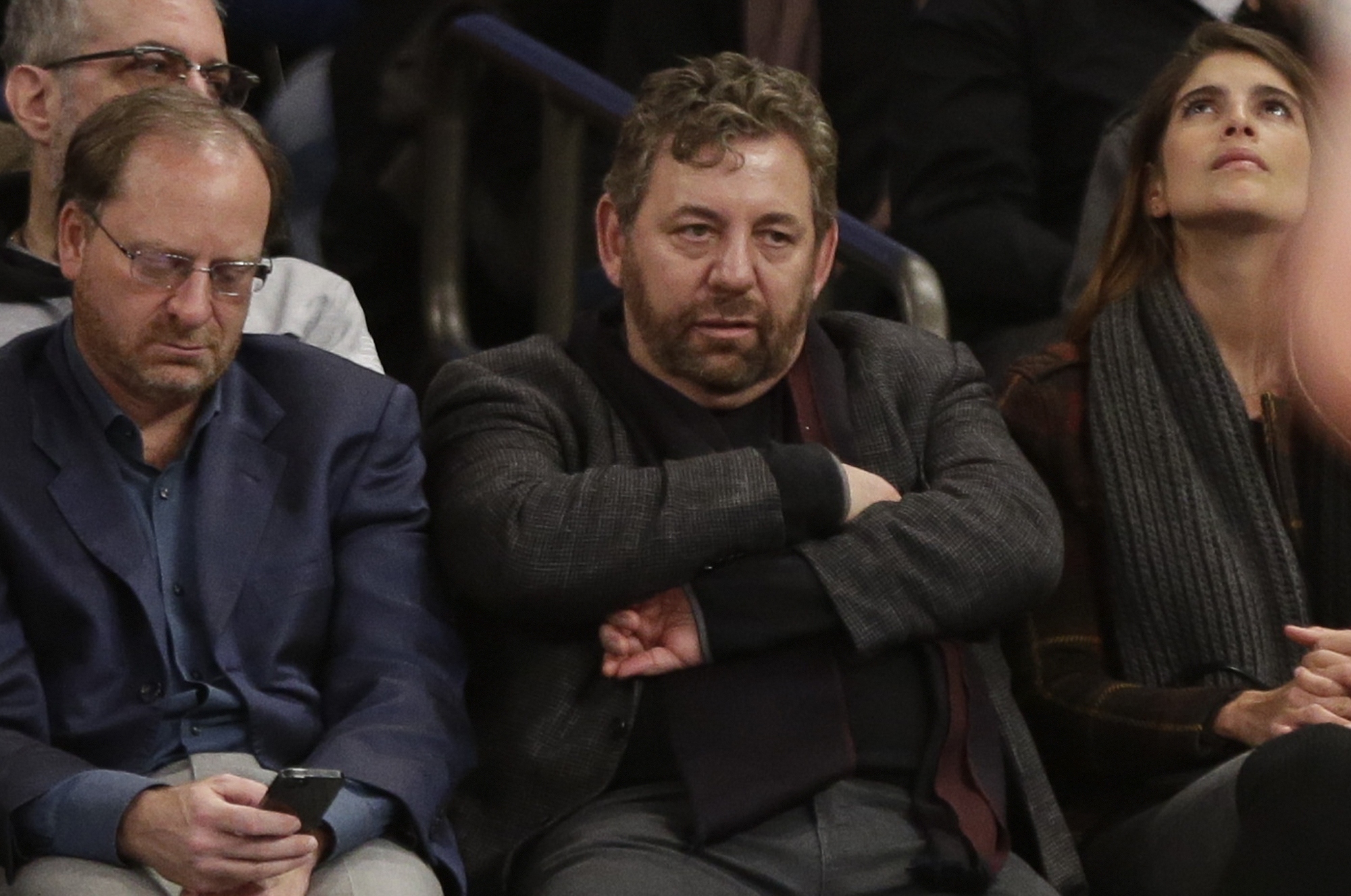 Madison Square Garden Chairman James Dolan, center, reportedly tested positive for coronavirus.