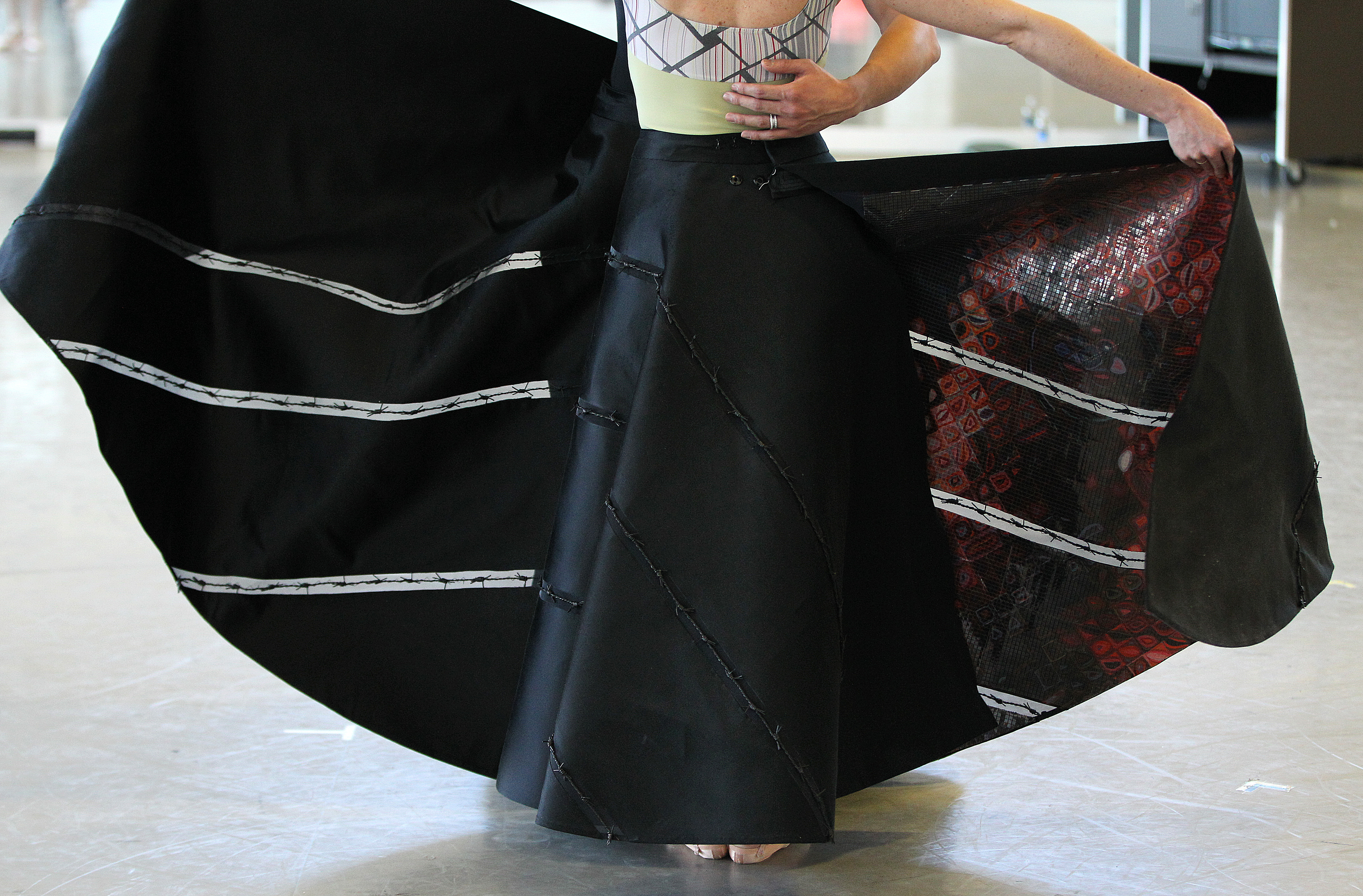The dancers’ skirts were designer Ralph Rucci’s idea of connecting the costumes to the backdrop, self-portraits by Close.