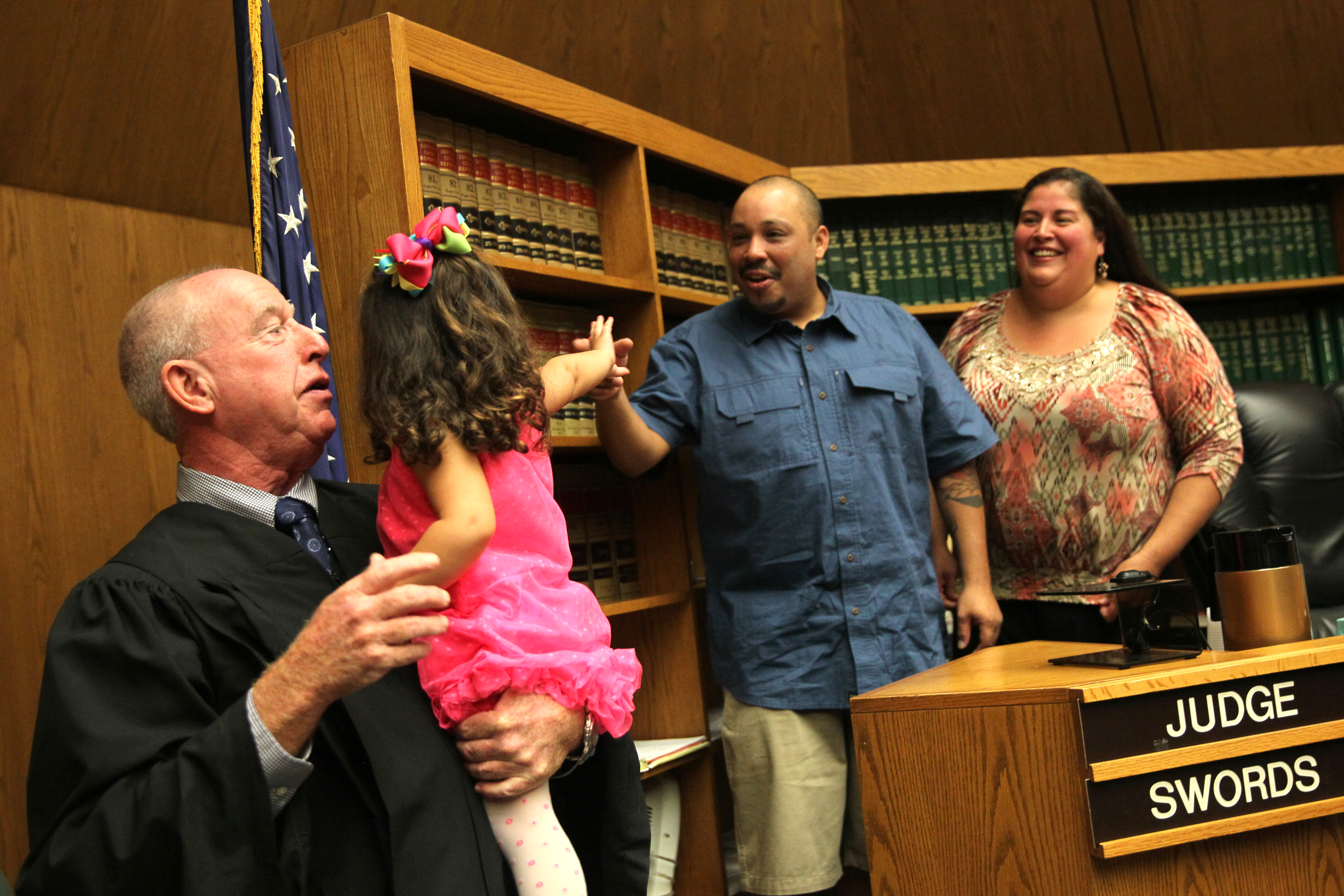First Justice Daniel Swords held a celebratory Alexandra after awarding permanent custody to Treehouse community residents Angel and Sandra Rubio in Hampden Juvenile Court in Springfield in September.
