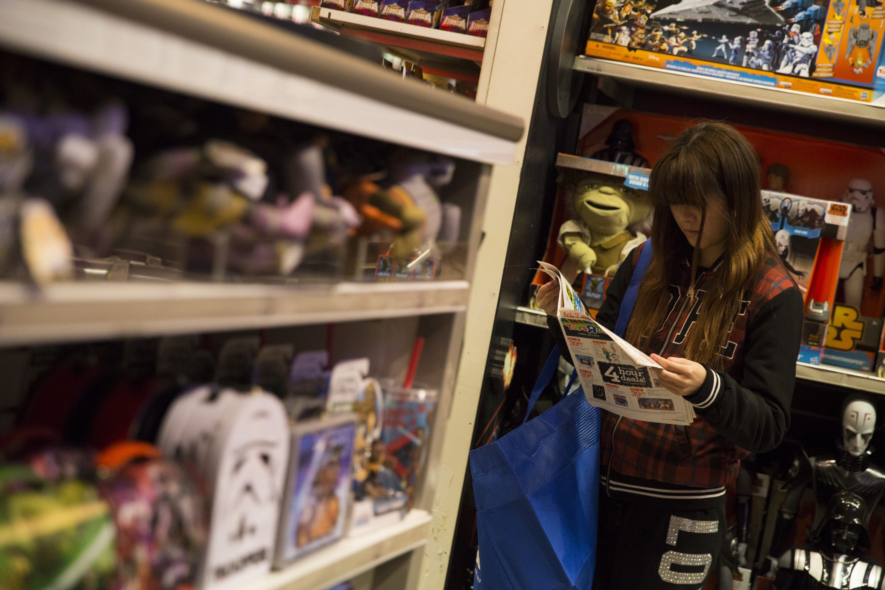Shoppers inside a Toys R Us store in New York’s Times Square.