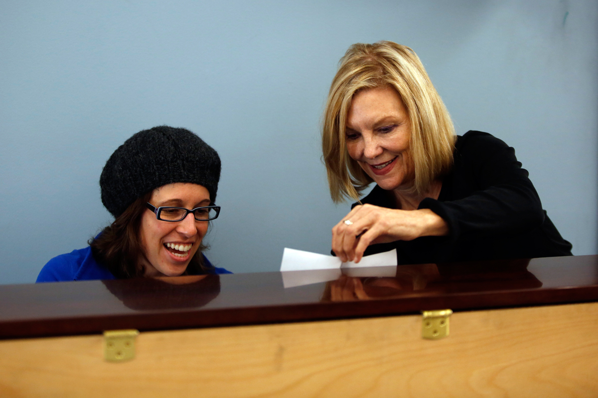Bonnie Hayes, who chairs the songwriting department at Berklee, turned the page for student Sabina Barton.