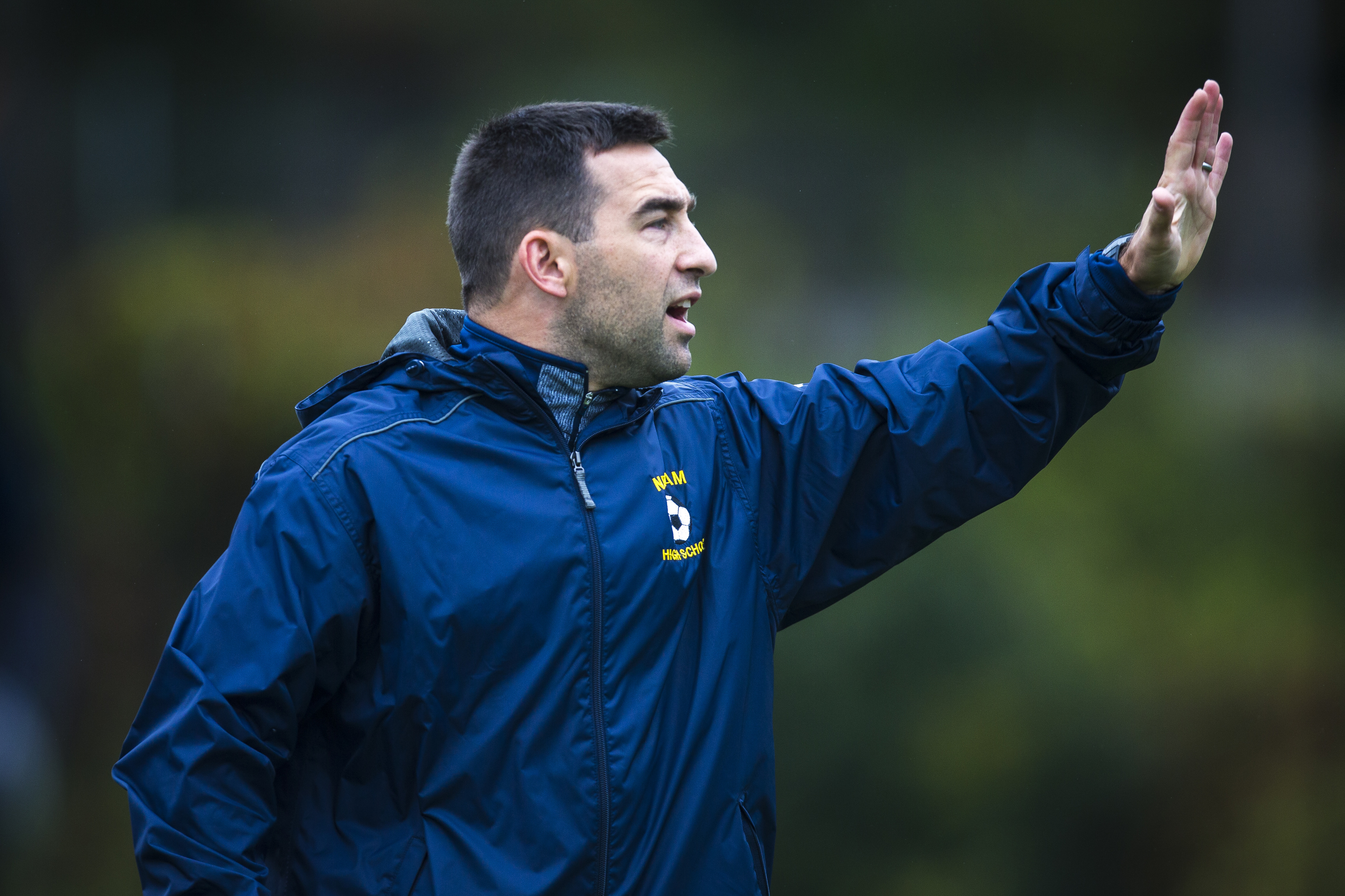 Needham head coach Jimmy Odierna shouts instructions to his team during a recent contest.