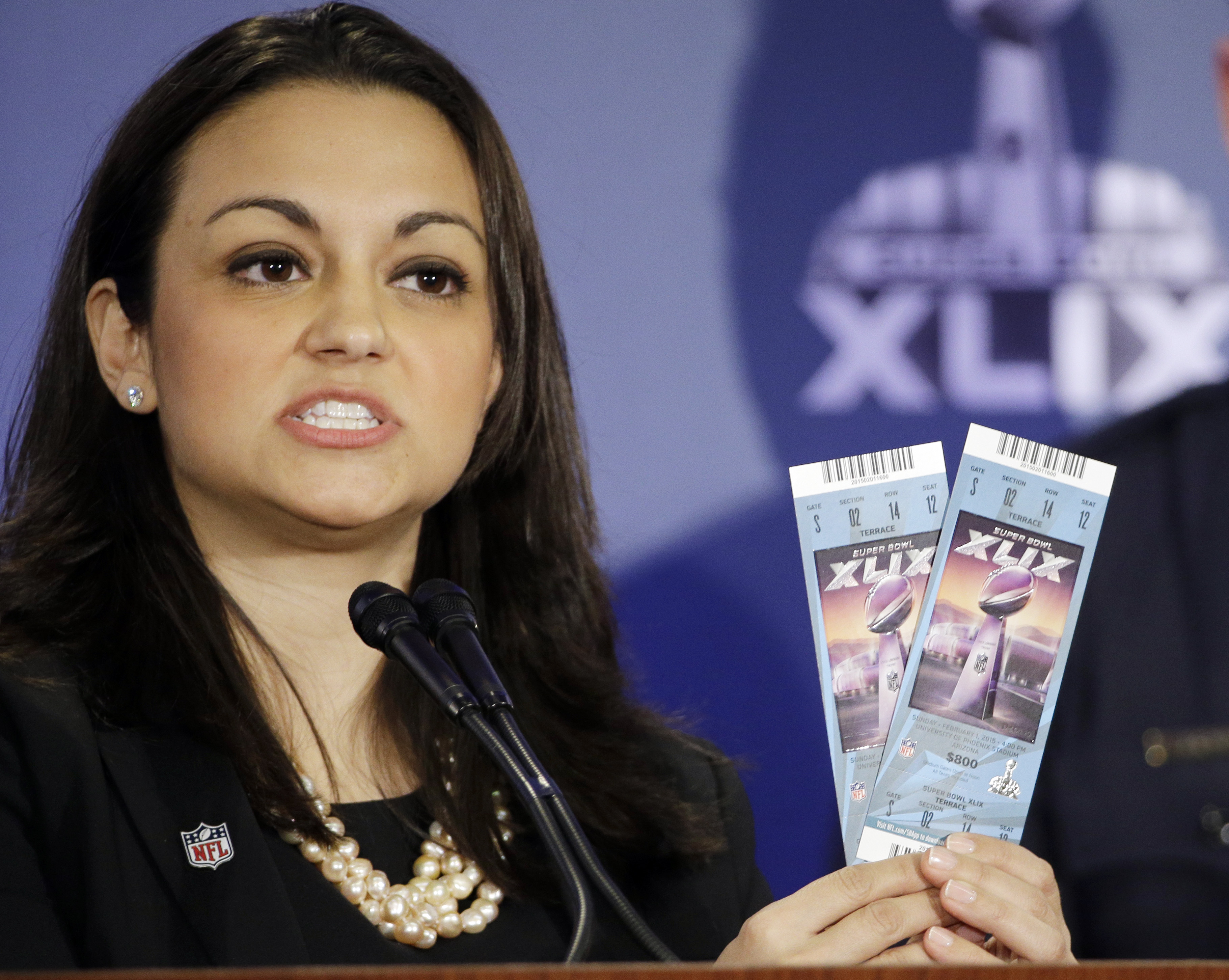Tickets with full security features were shown during a press conference.