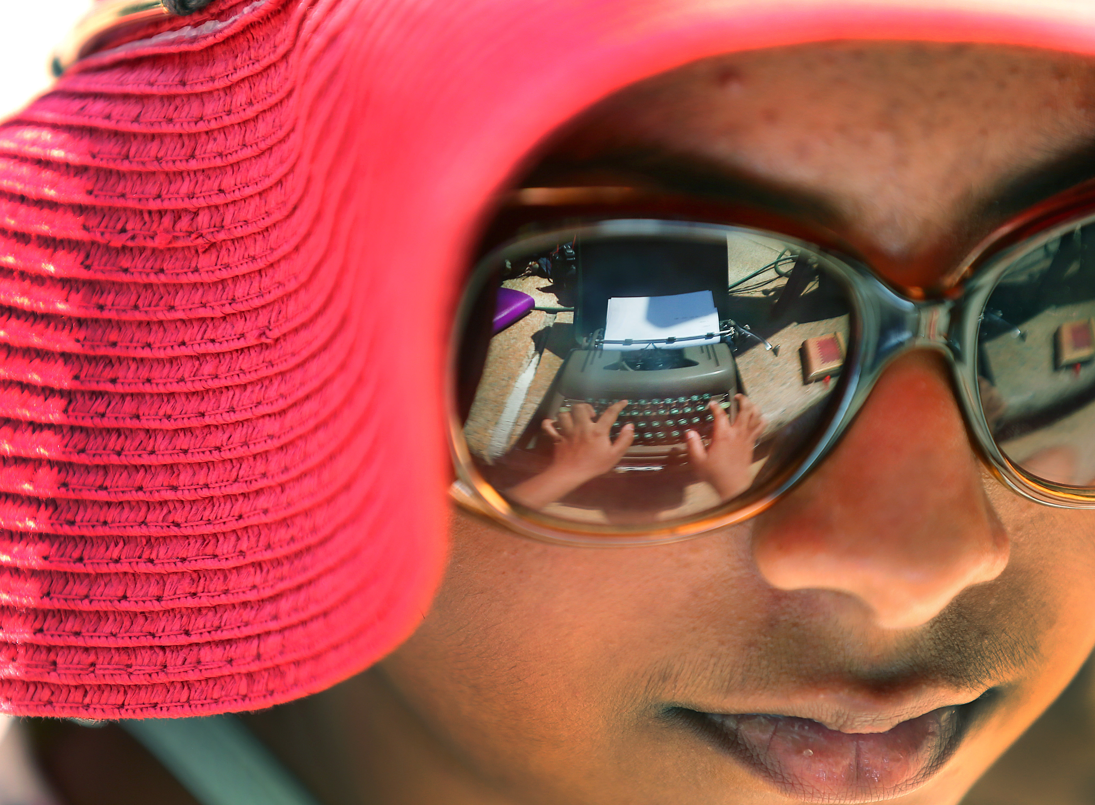 Mahiti Bapuji, 12, had the typewriter she was working on reflected in her glasses as she typed.