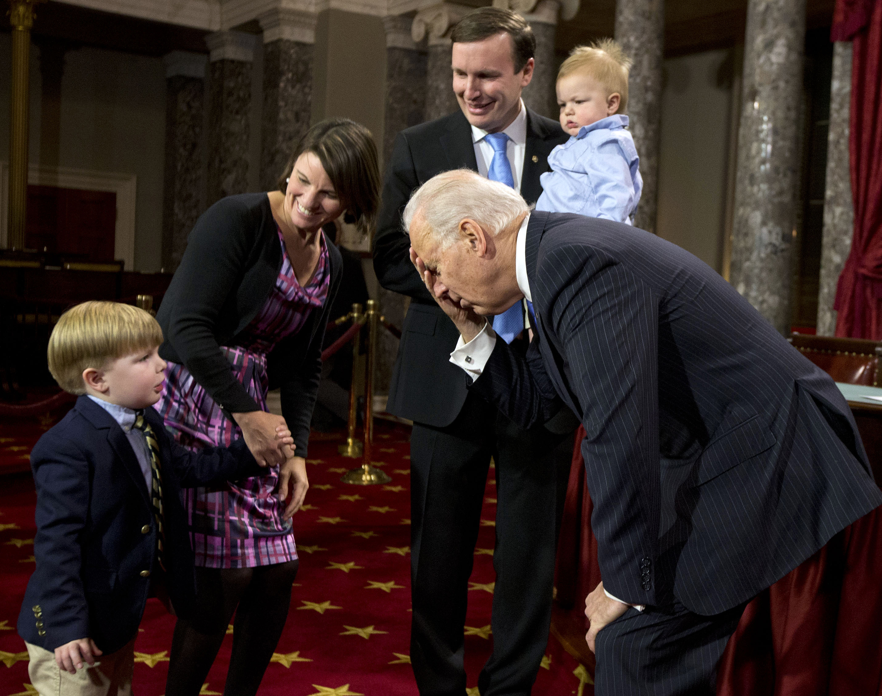 Vice President Joe Biden joked around with Owen Murphy, son of Senator Chris Murphy, Democrat of Connecticut, before a mock swearing-in ceremony for the 113th Congress.