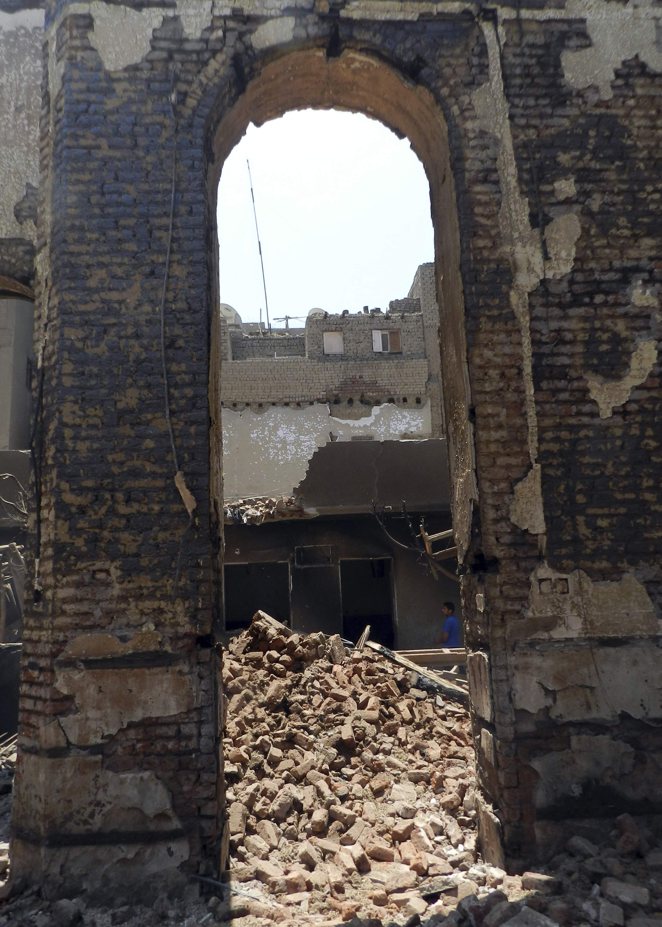 A burnt and destroyed Evangelical Church south of Cairo was in ruins earlier this month.