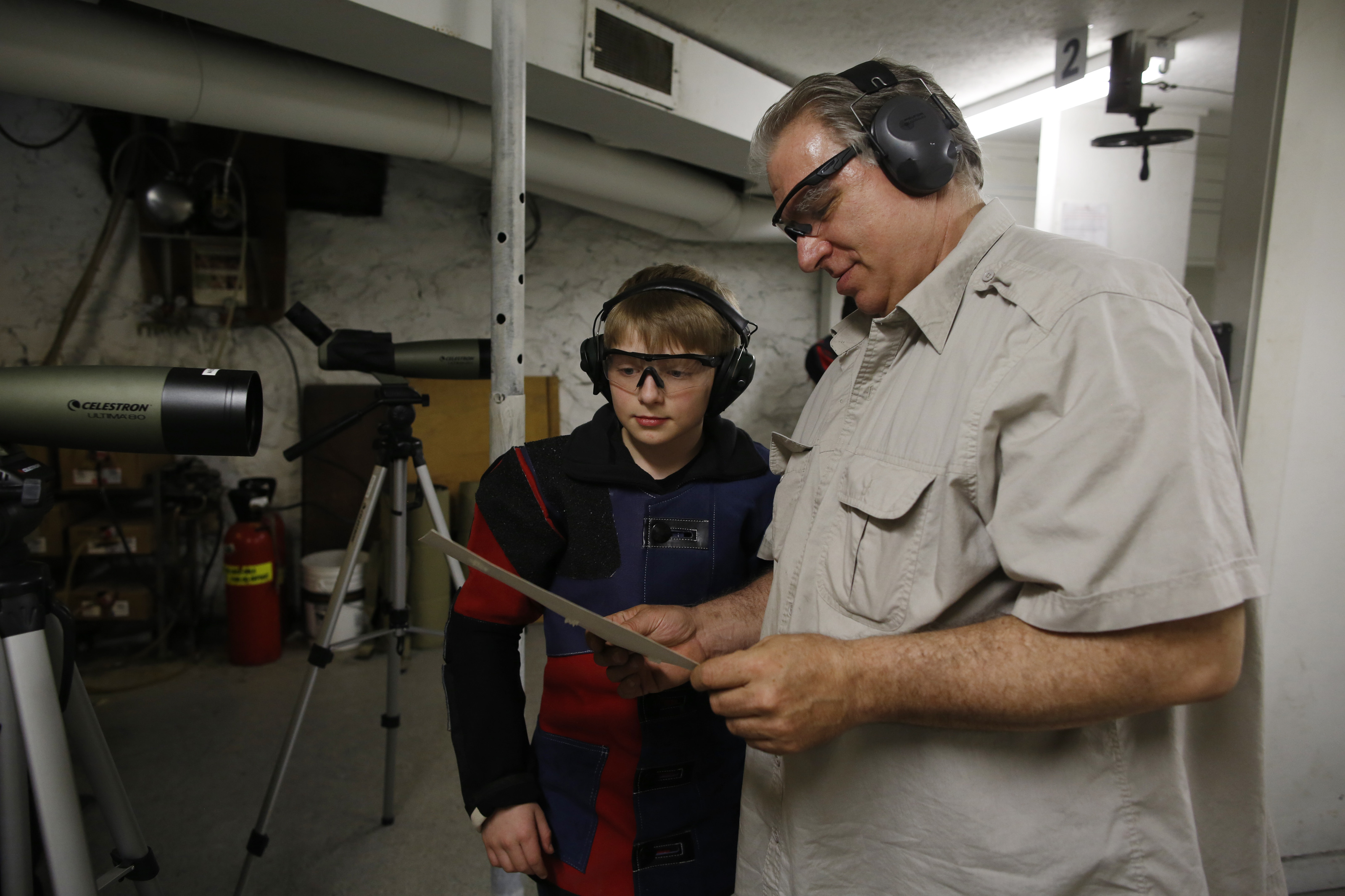 Rio Ferguson, (left), and his father, Jay (right), both enjoy guns. “I just like to shoot,” Rio says. “I just like holding that beautiful creation in my hands.” Rio also plays tennis, practices his yo-yo, and fishes.