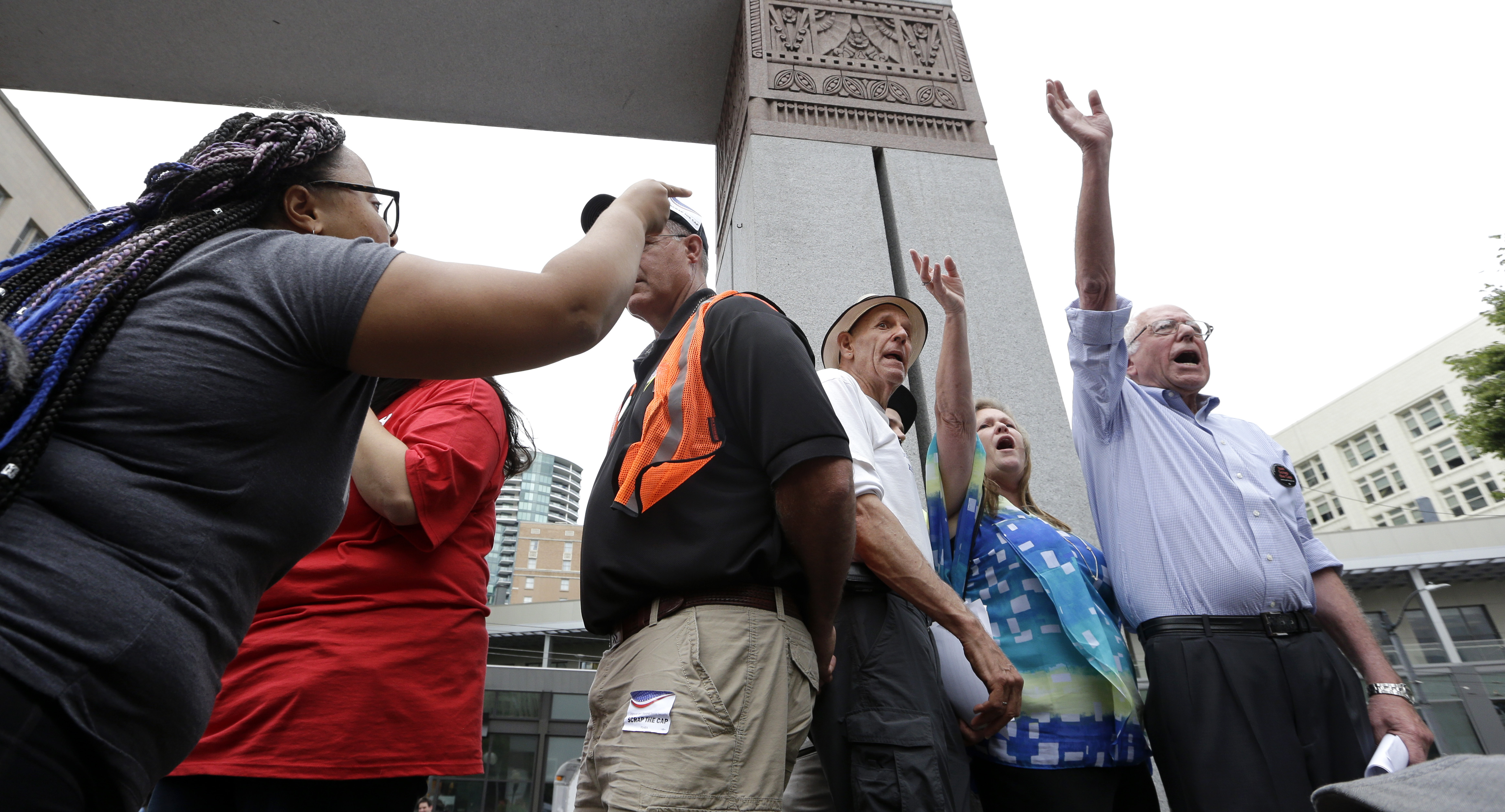 Protesters stormed the stage and took over the microphone at a Bernie Sanders event in Seattle.