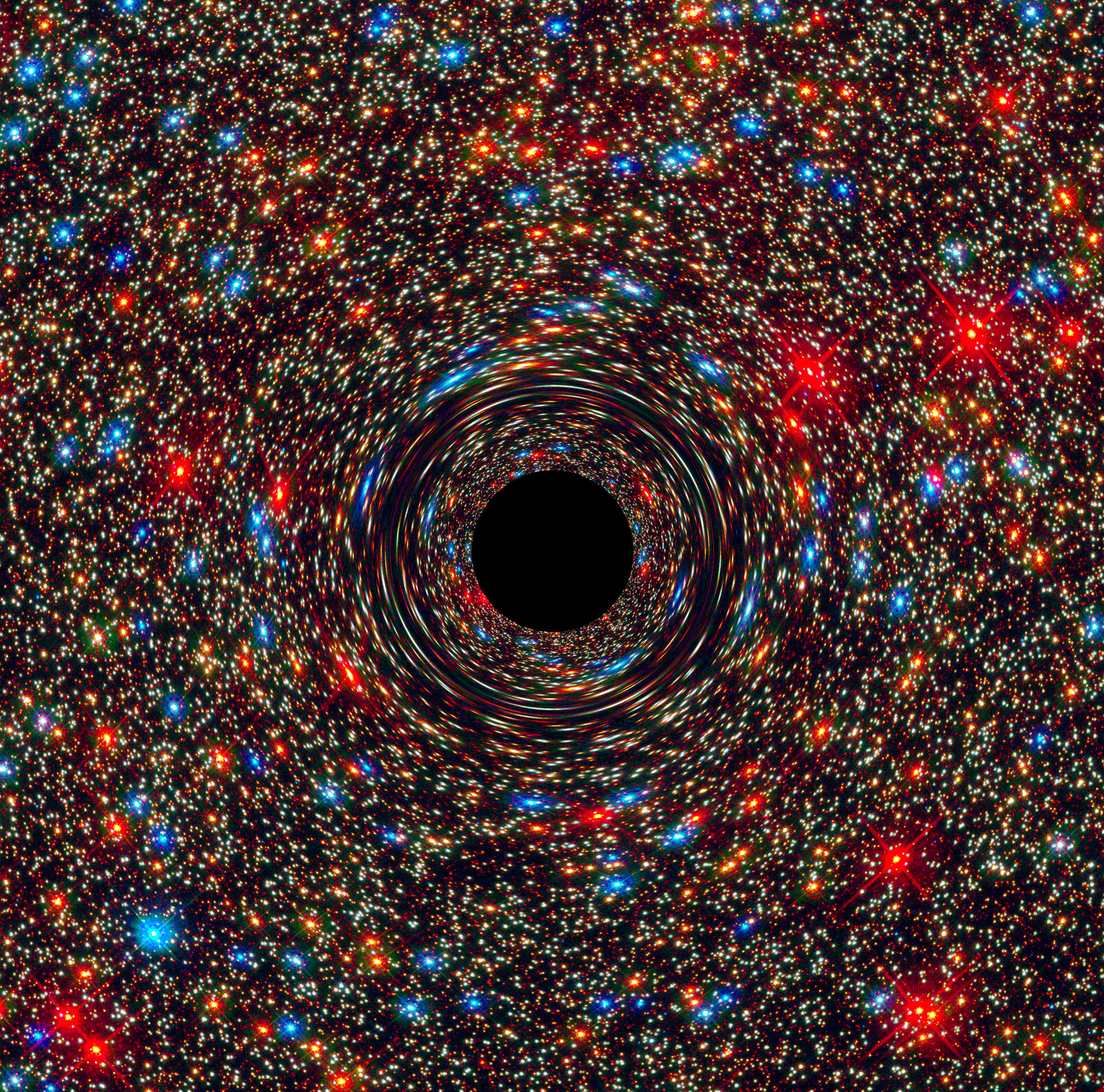 A computer-simulated image of a supermassive black hole at the core of a galaxy. At the end of their lives, really massive stars explode into supernovas and then become either neutron stars or black holes.