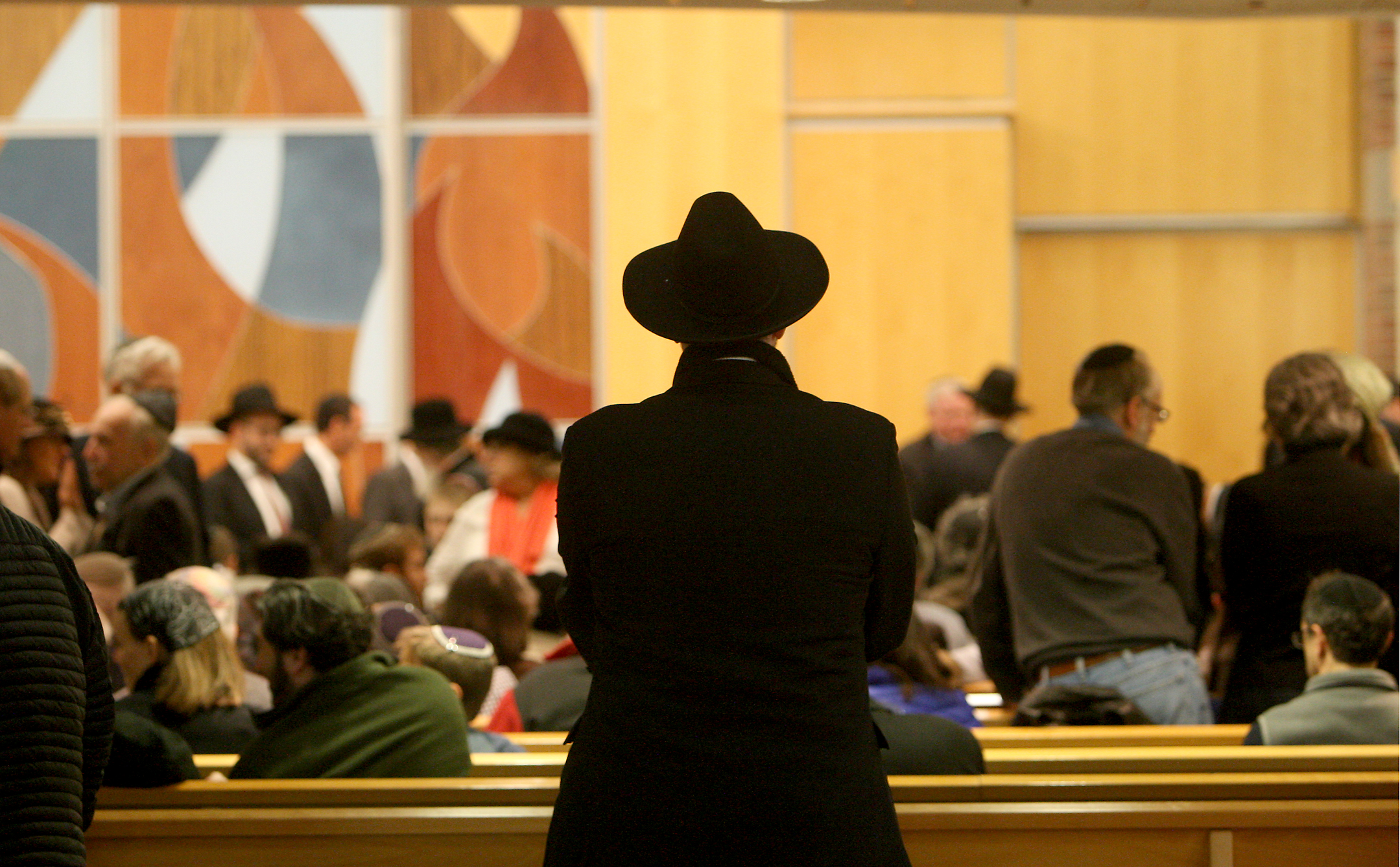 A crrowd gathered in the S. Joseph Solomont Synagogue at the Maimonides School in Brookline before a memorial service for Rabbi Mosheh Twerskey.