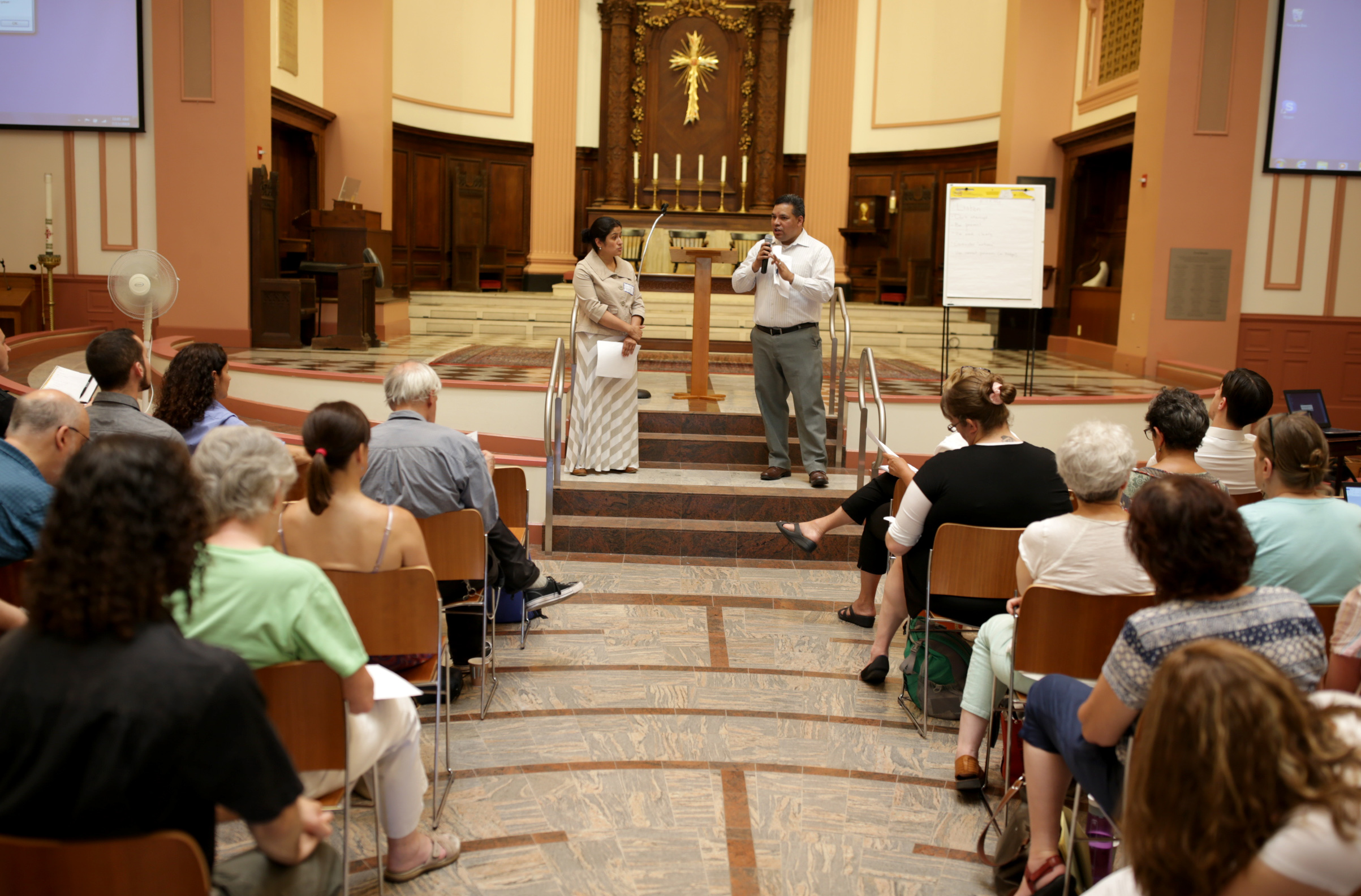 Doris Landaverde (left) and Jose Palma spoke at the Cathedral of Saint Paul in Boston on Saturday.