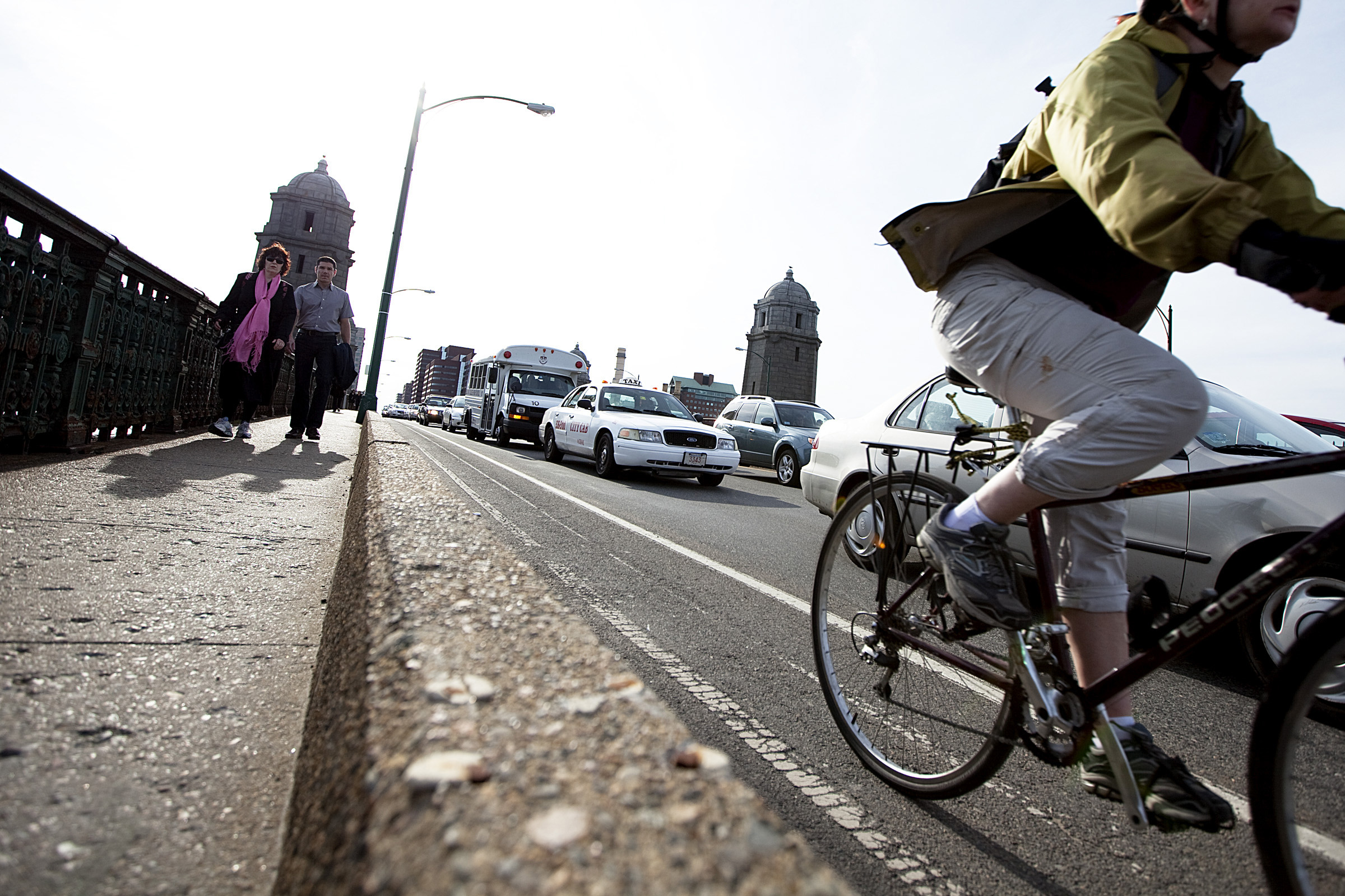 A bike rider and pedestrians made their way across the Longfellow Bridge in 2010.