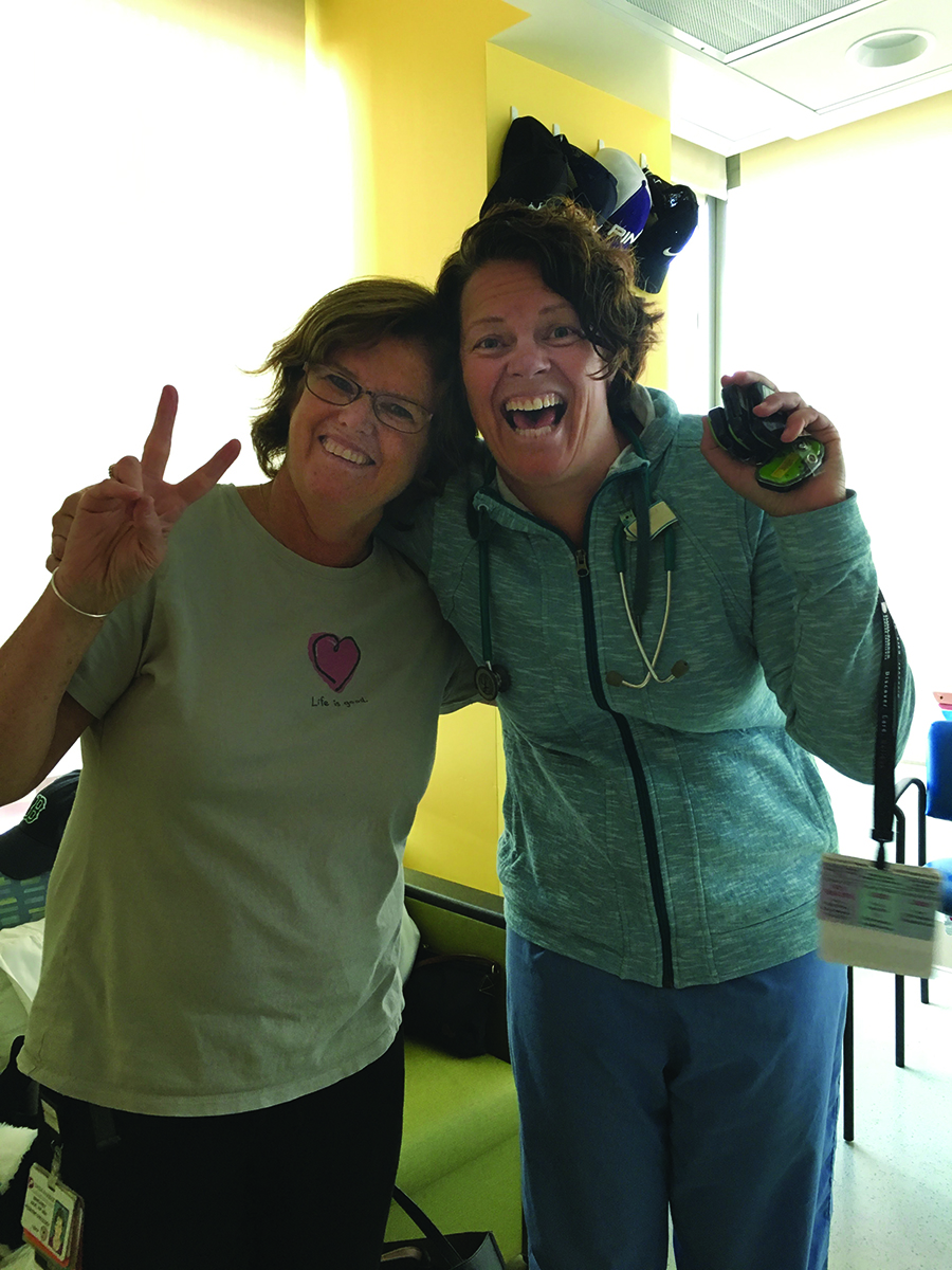Dana-Farber nurses Margaret Julio (left) and Amanda Carnes visiting Mike at Children’s.
