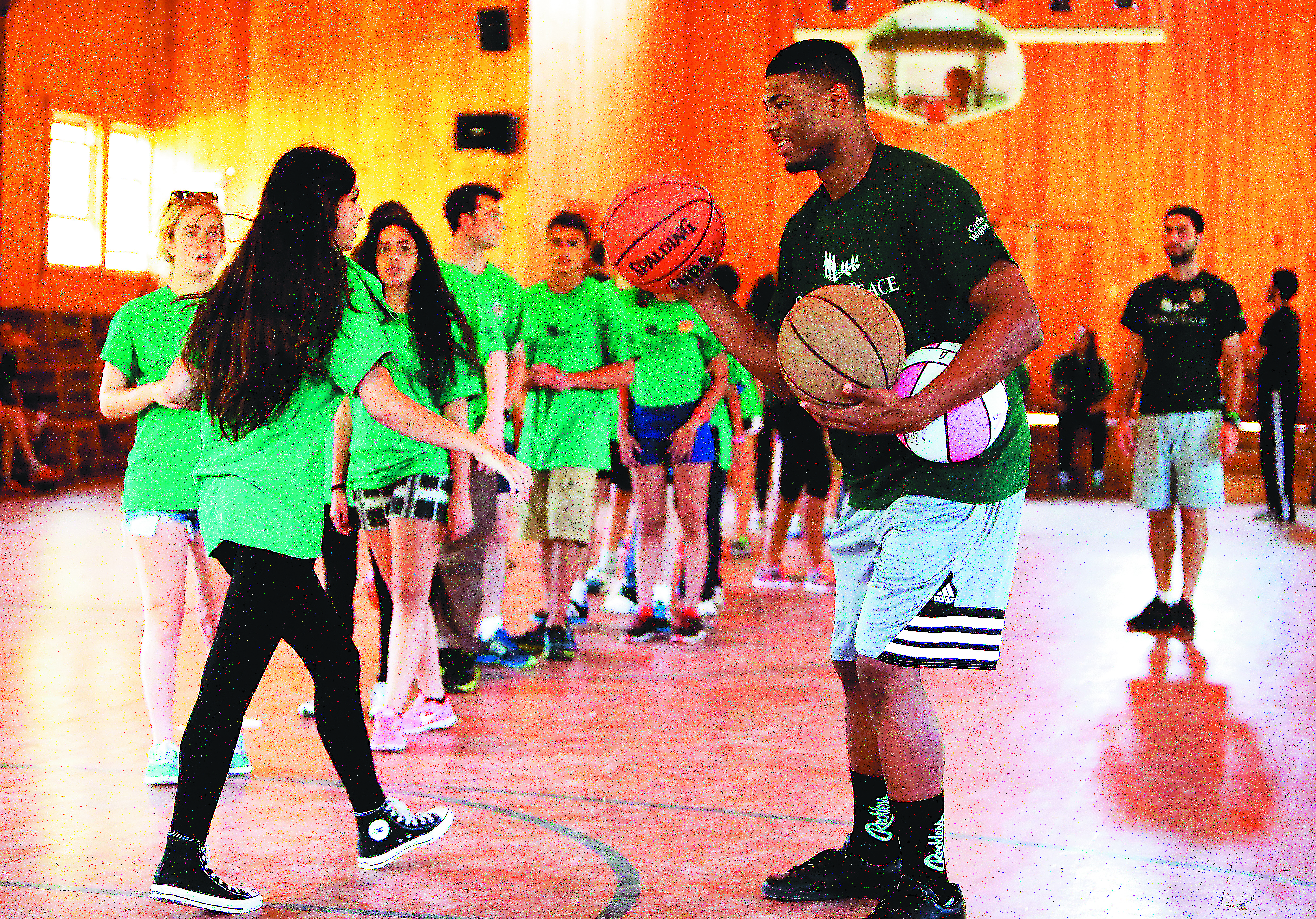 Marcus Smart was one of several NBA players who volunteered their time for the Seeds of Peace camp in Otisfield, Maine, last month.