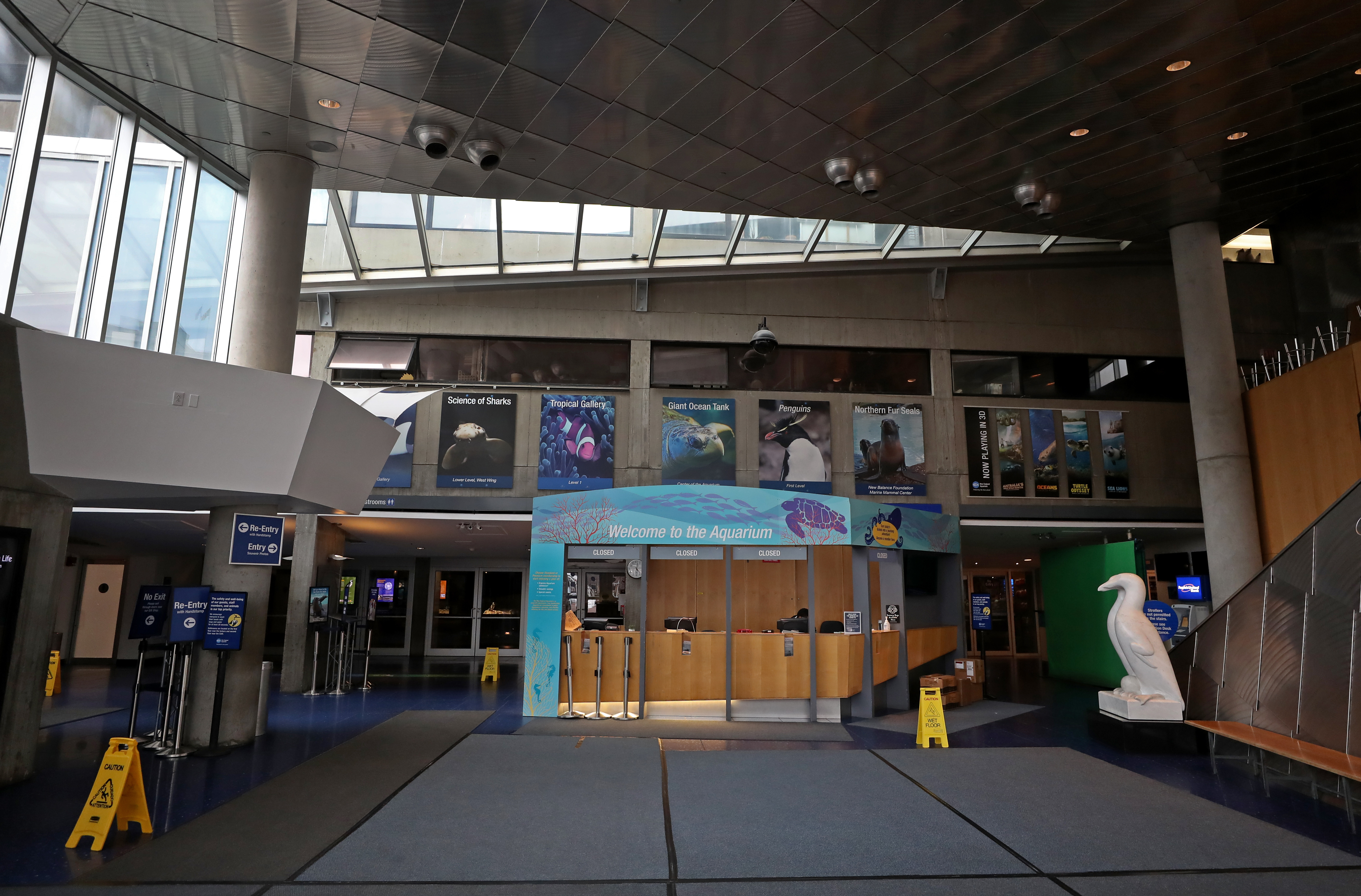 The lobby of the New England Aquarium sits empty.