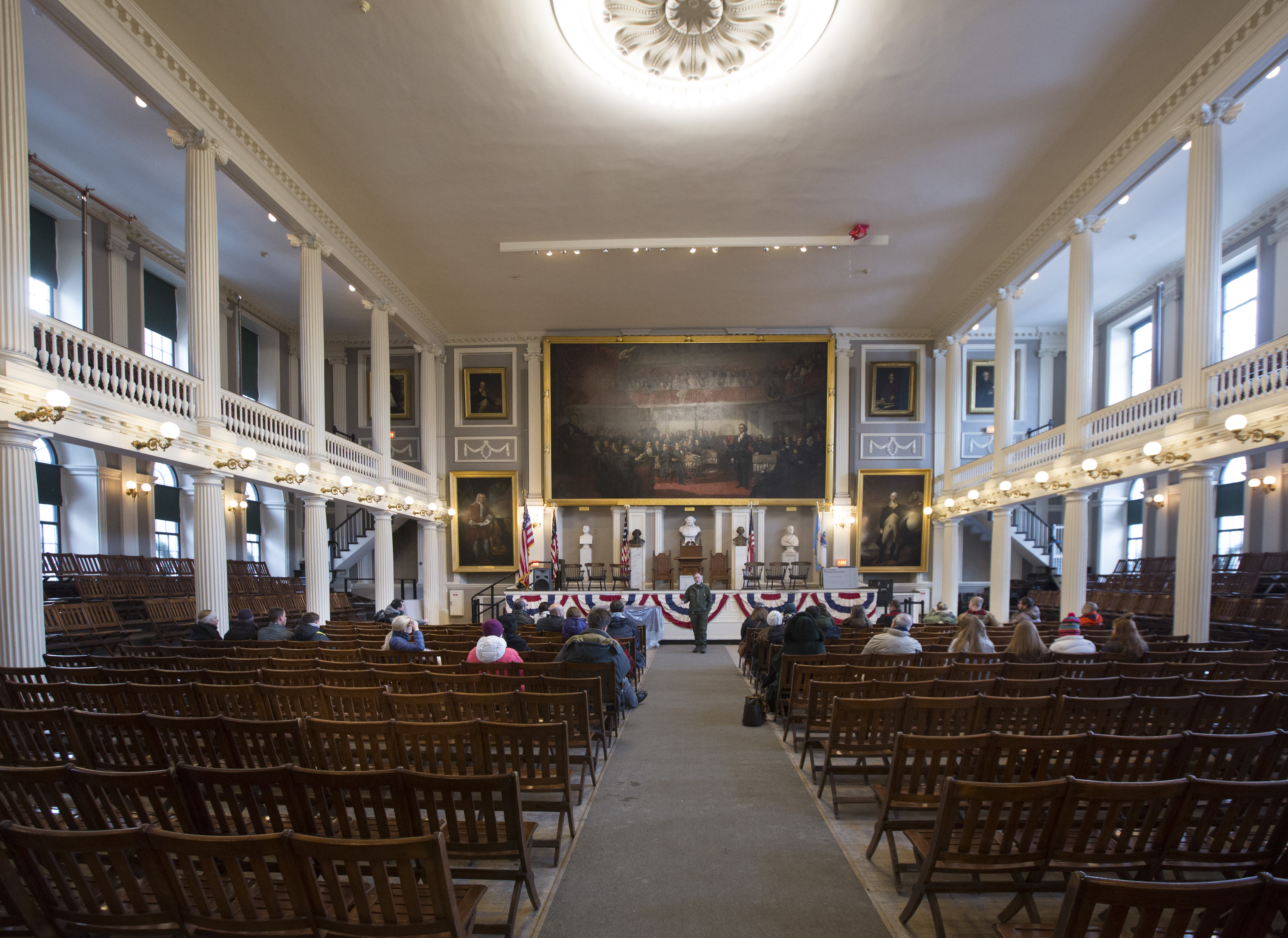 A guide led a tour of Faneuil Hall on Saturday.
