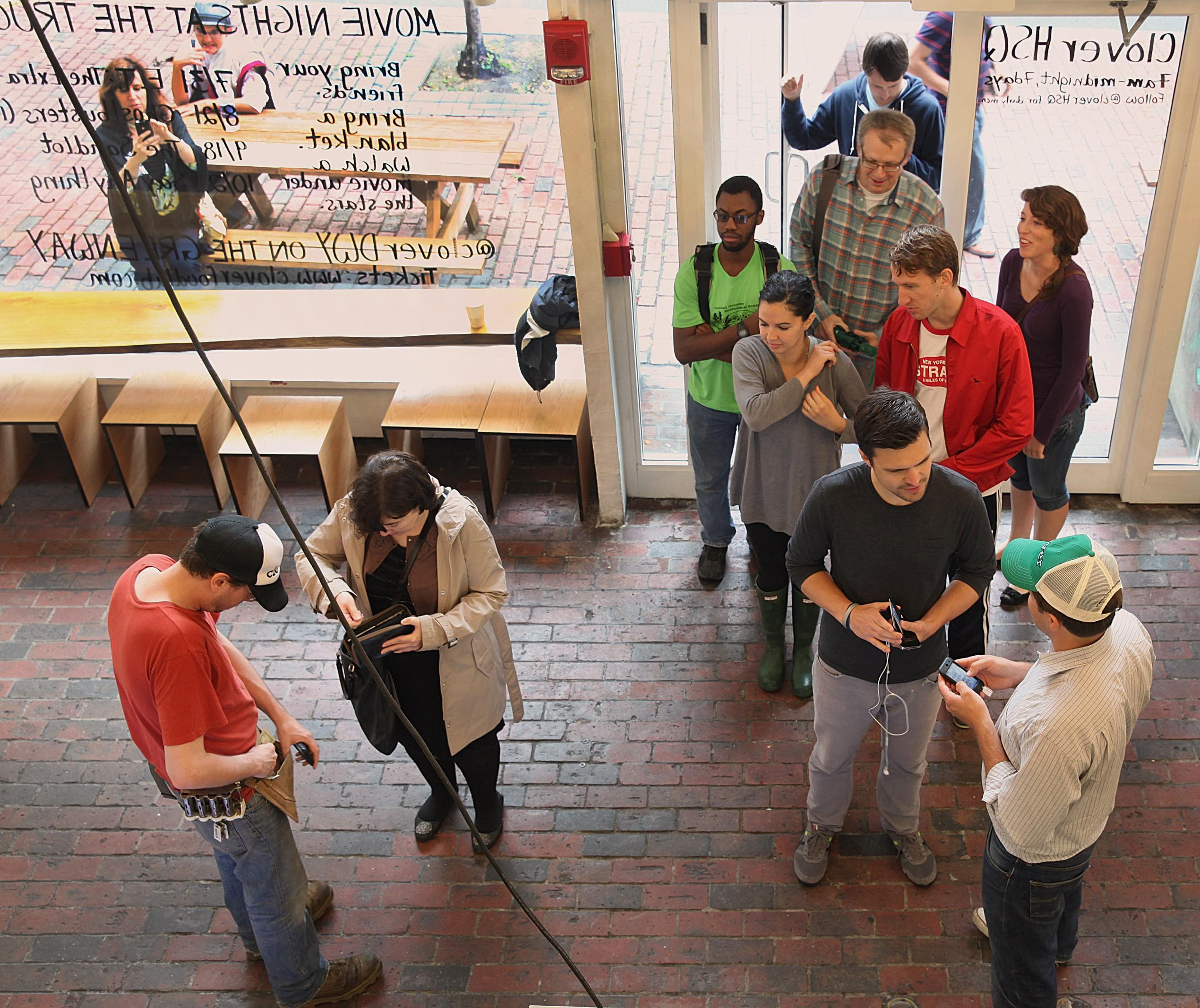 Customers lined up at the Clover Food Lab in Harvard Square on Friday. It reopened last Thursday.