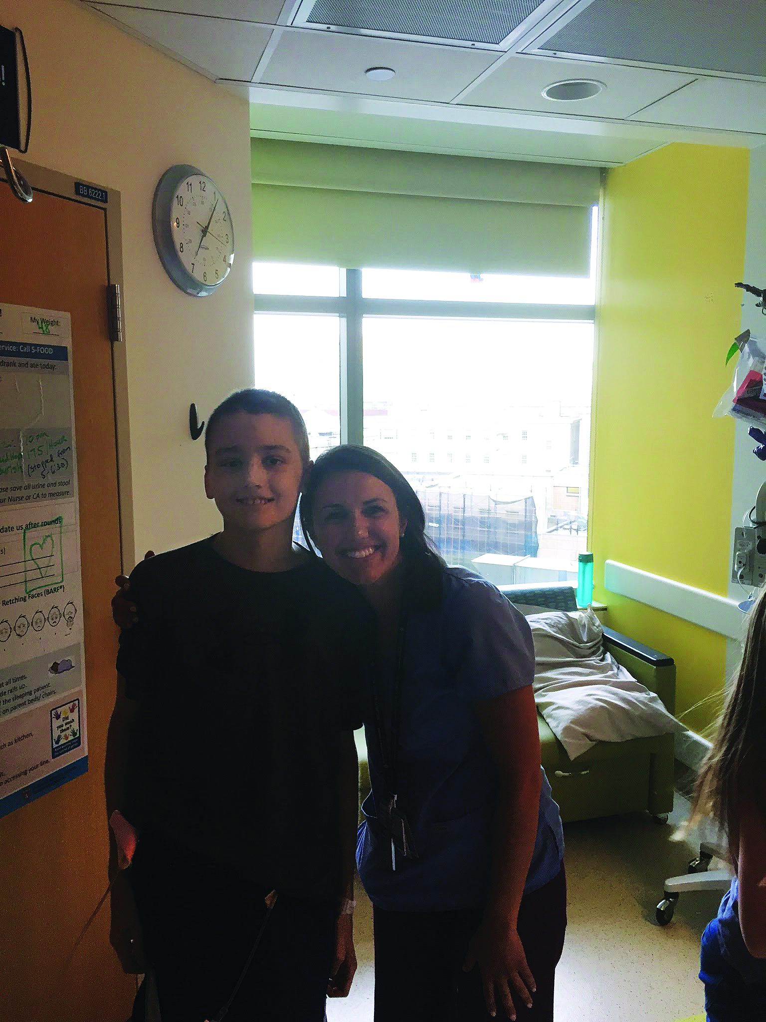 Michael with Carly Moran, an inpatient nurse at Boston Children’s Hospital.